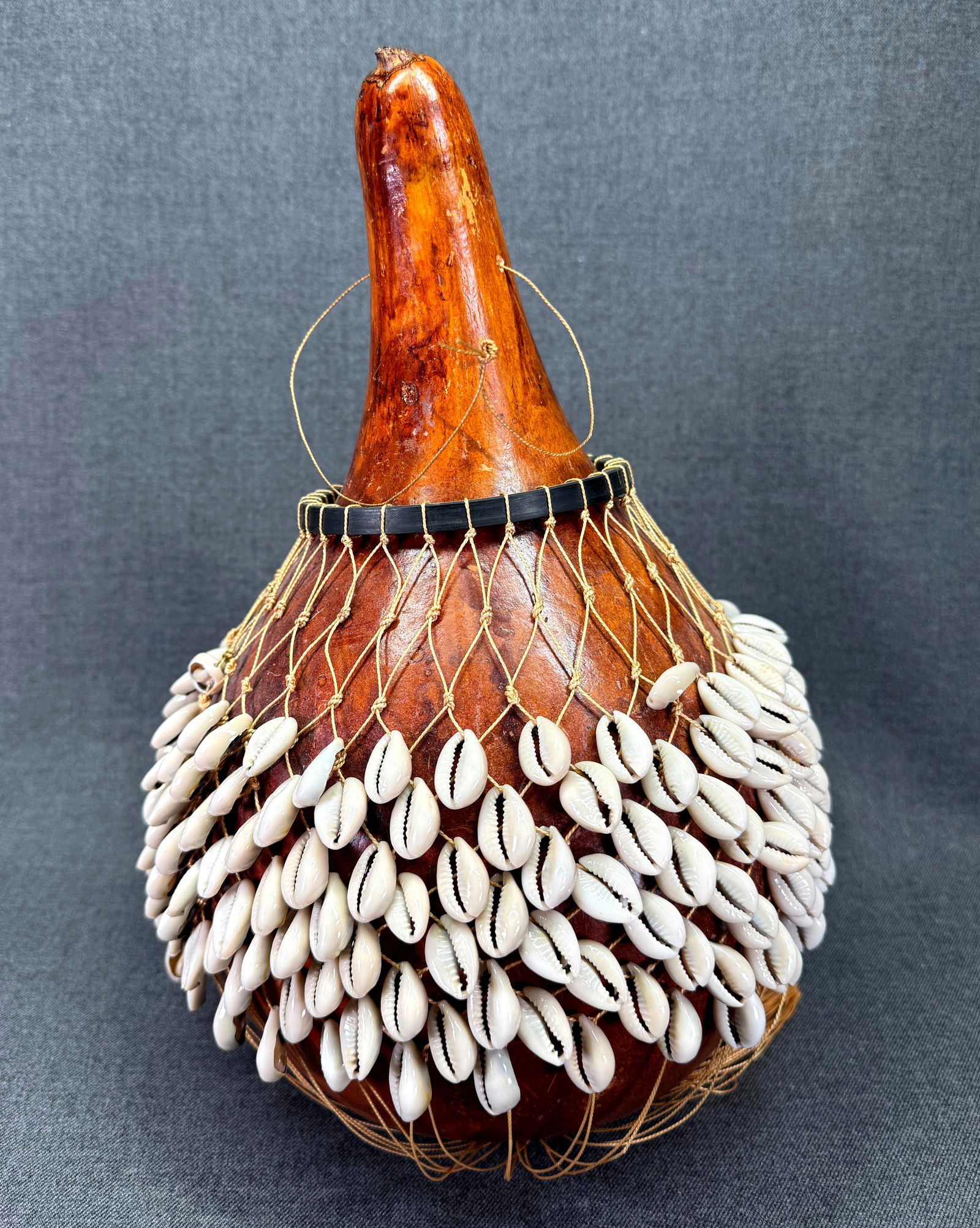 African Shekere percussion instrument rattle. Gourd, cowrie shells, cord.: IN HOUSE FLAT SHIPPING & HANDLING COST WITHIN ALL THE U.S. : 15 To bypass LiveShipping, and use our In-House shipping service for 15 or shipping combined for multiple lots, please select “Arrang