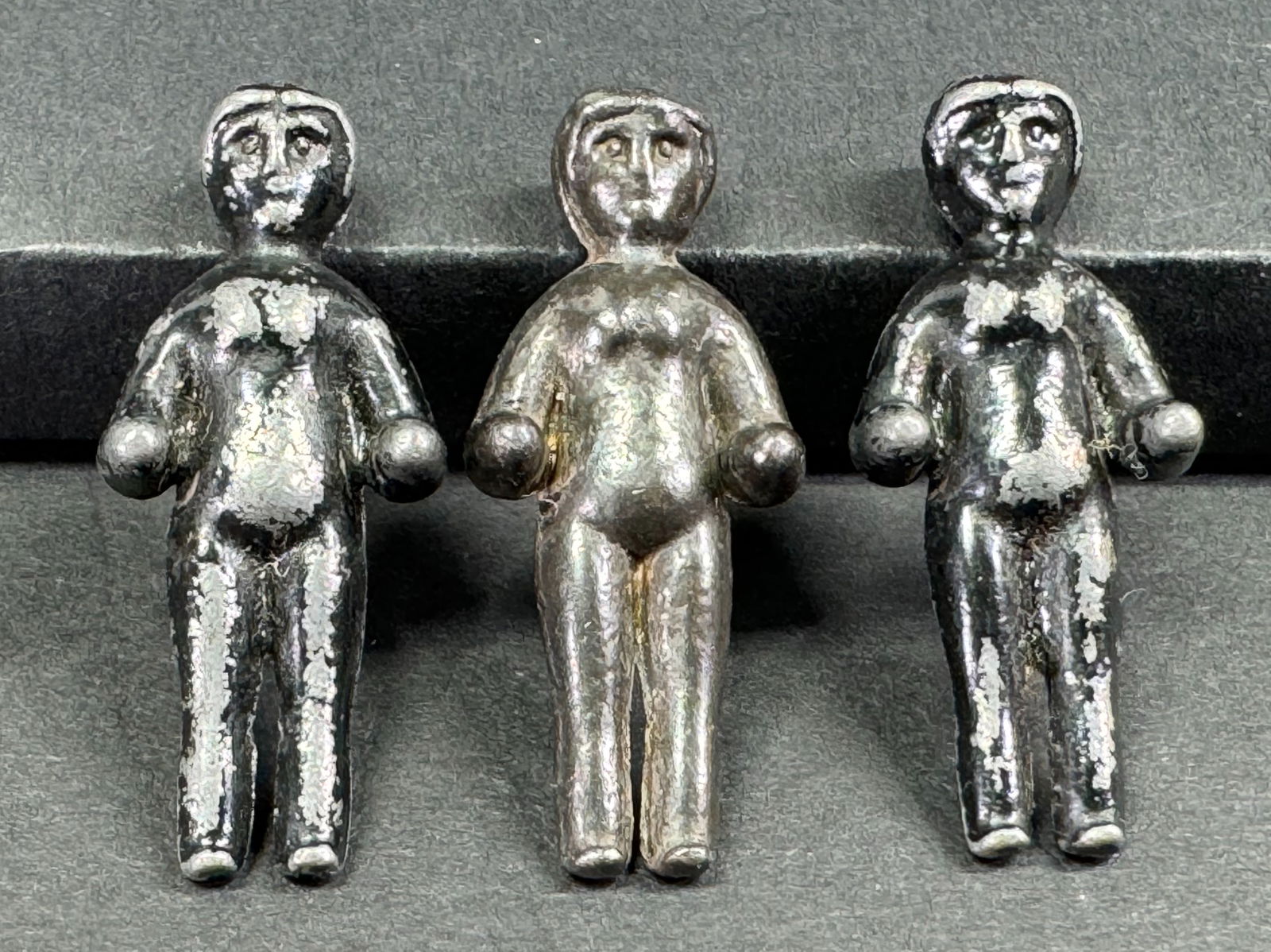 Vintage painted black metal frozen Charlotte style miniature tiny dolls. Lot of 3. (1 of 4)