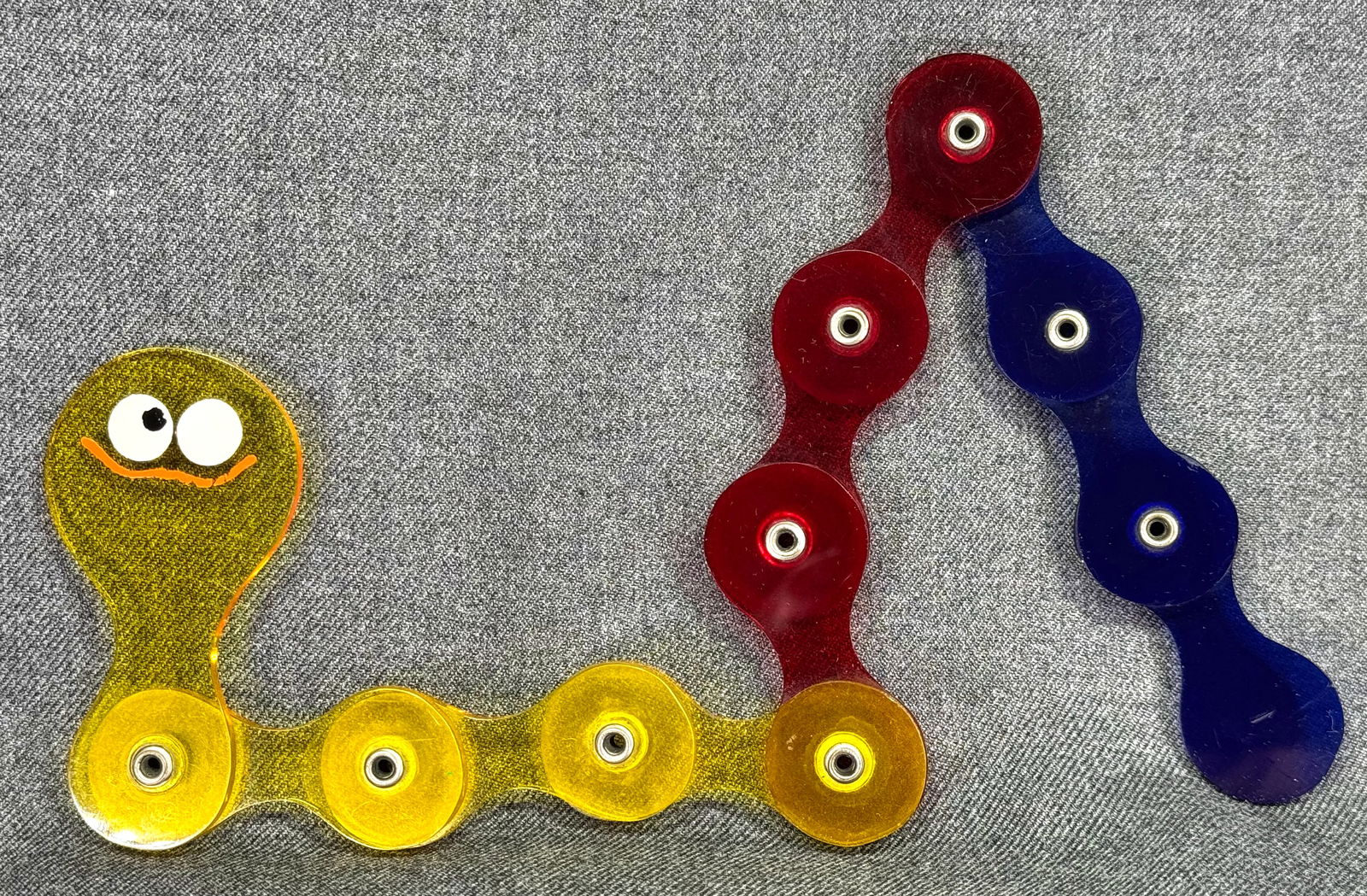 Vintage color lucite wiggly articulated folding worm or snake: IN HOUSE FLAT SHIPPING & HANDLING COST WITHIN ALL THE U.S. : $7 To bypass LiveShipping, and use our In-House shipping service for $7 or shipping combined for multiple lots, please select “Arrange Yo