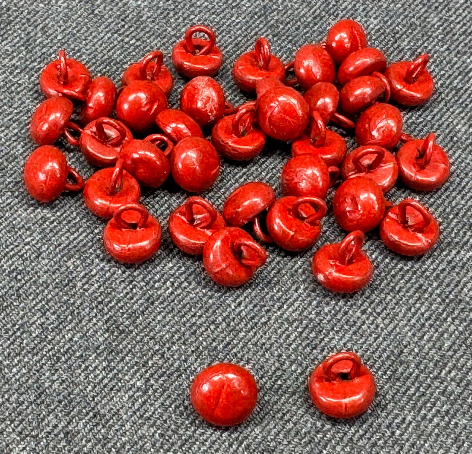 Vintage red shoe buttons. Lot of 36 (1 of 3)