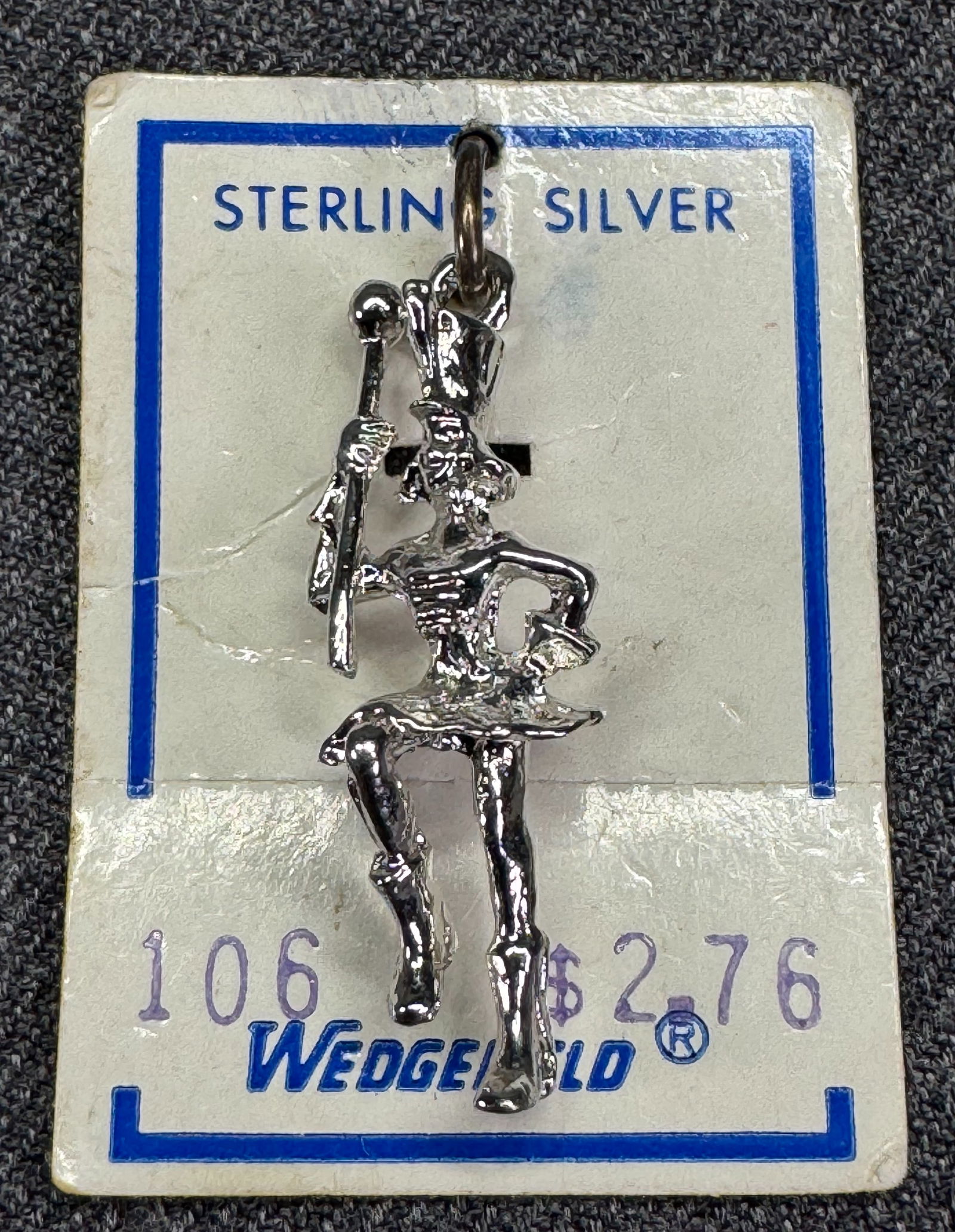 Vintage Wedgefield sterling silver majorette bracelet charm pendant. Unused in card: Vintage Wedgefield sterling silver majorette bracelet charm pendant. Unused in card. For measures please refer to the pictures taken with a measuring tape. Weight: Grams . IN HOUSE FLAT SHIPPING & HAN