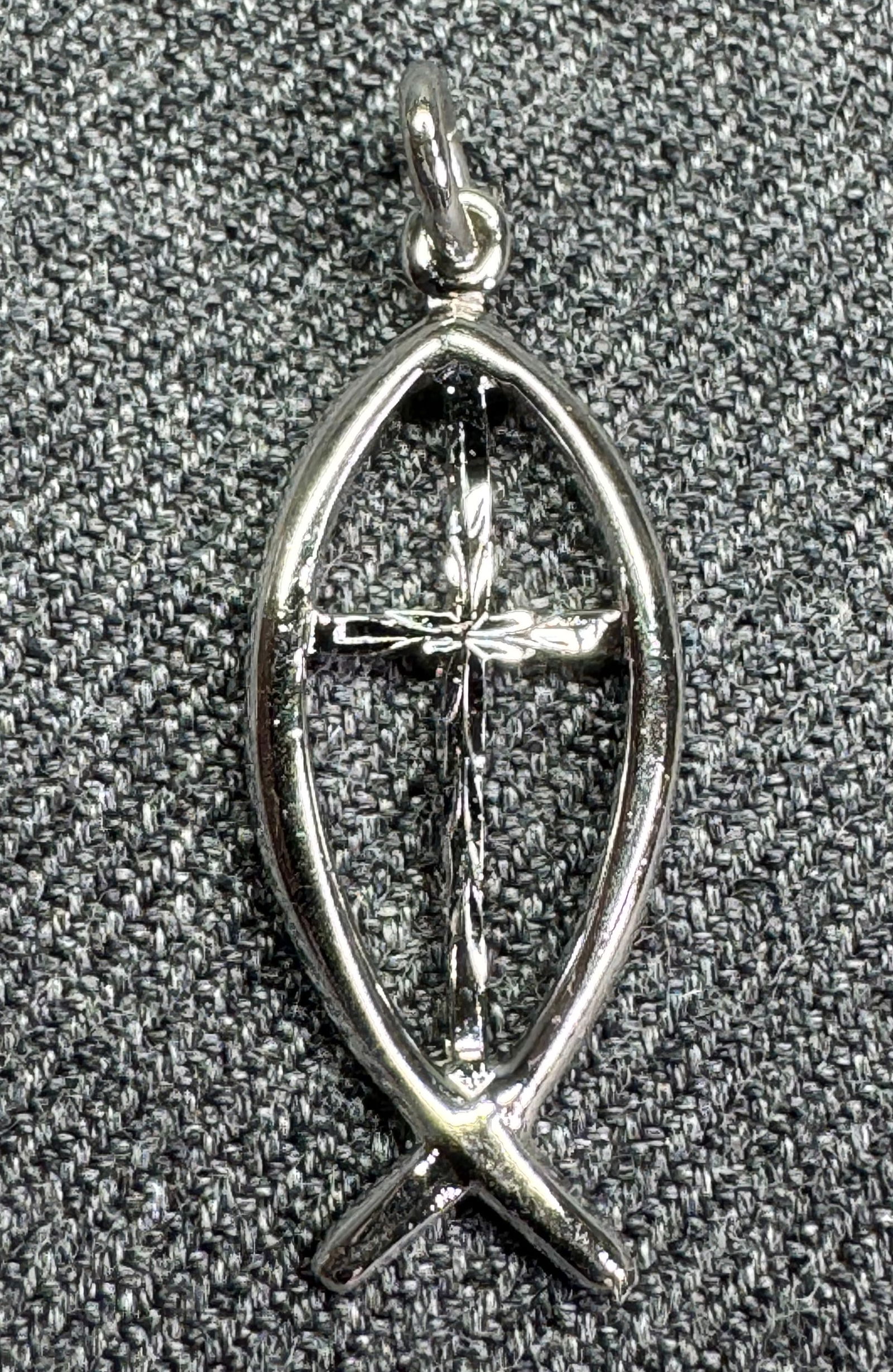 Vintage Theda sterling silver fish cross bracelet charm pendant.: Vintage Theda sterling silver fish cross bracelet charm pendant. Marked. For measures please refer to the pictures taken with a measuring tape. Weight: 1.15 Grams . IN HOUSE FLAT SHIPPING & HANDLING C