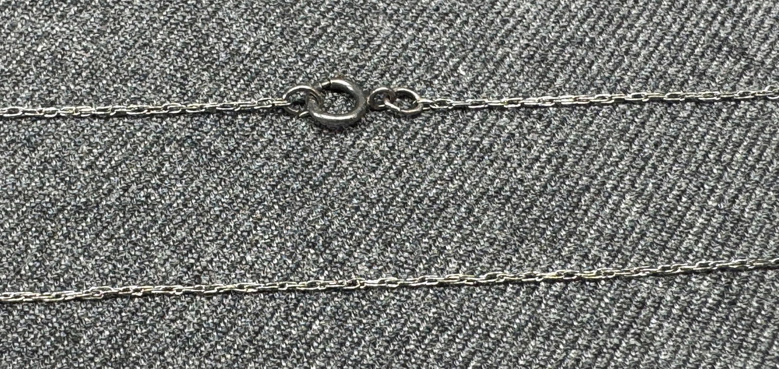 Vintage PPC sterling silver chain strap necklace: Vintage PPC sterling silver chain strap necklace. Marked PPC STG. For measures please refer to the pictures taken with a measuring tape. Weight: 0.87 Grams . IN HOUSE FLAT SHIPPING & HANDLING COST WIT