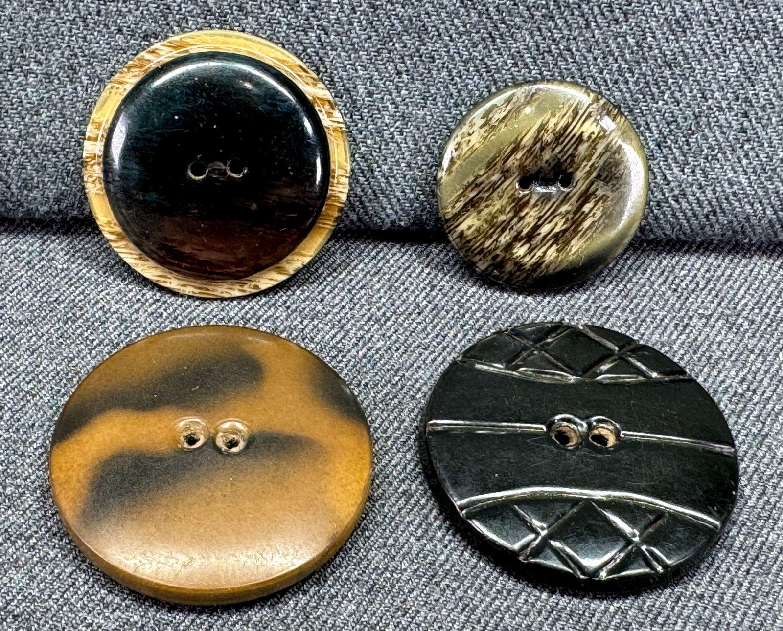 Antique assorted celluloid buttons. Tin back. Lot of 4 (1 of 4)