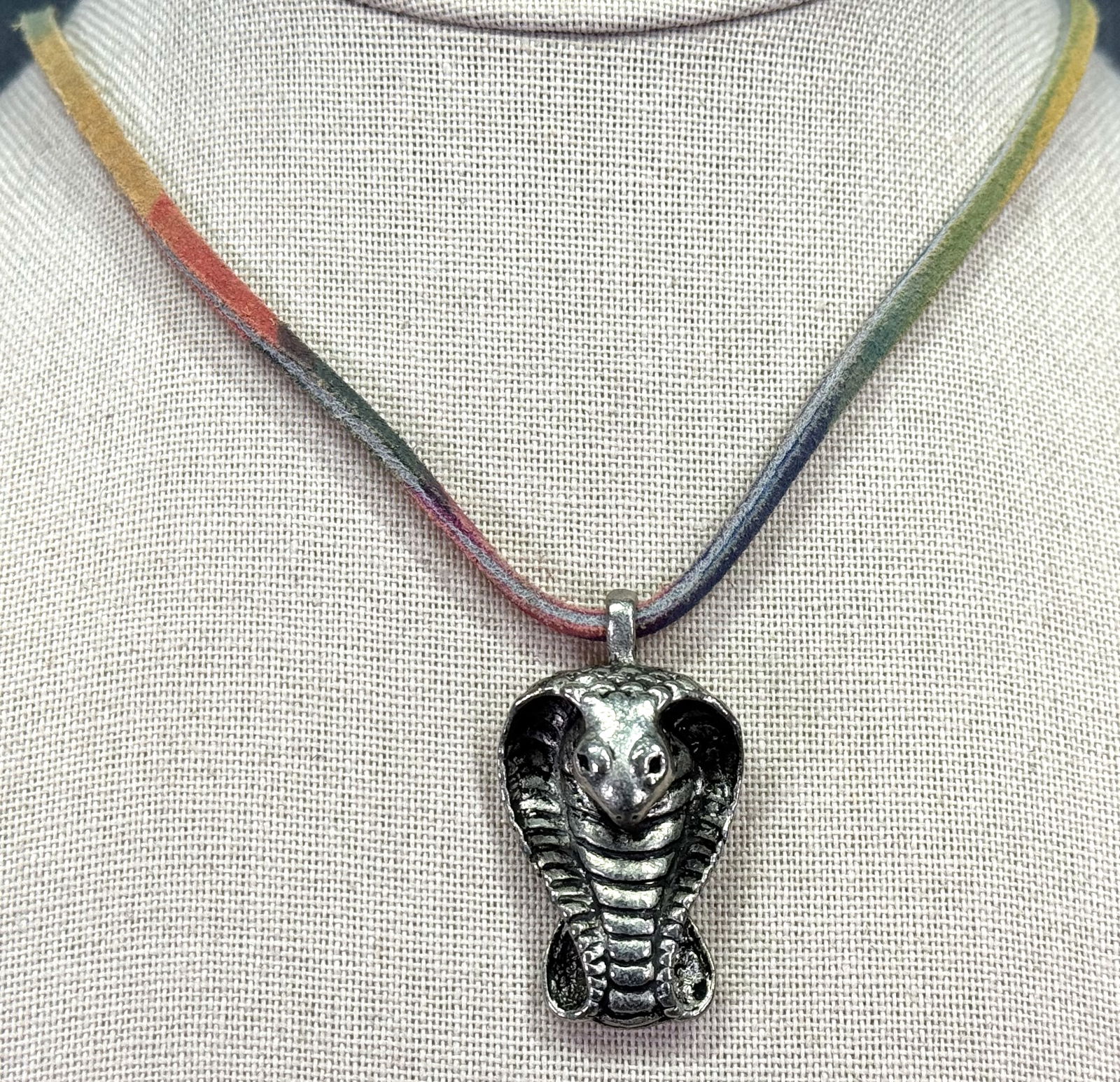 Black accents silvertoned metal cobra pendant colored leather strap necklace: IN HOUSE FLAT SHIPPING & HANDLING COST WITHIN ALL THE U.S. : $7 To bypass LiveShipping, and use our In-House shipping service for $7 or shipping combined for multiple lots, please select “Arrange Yo