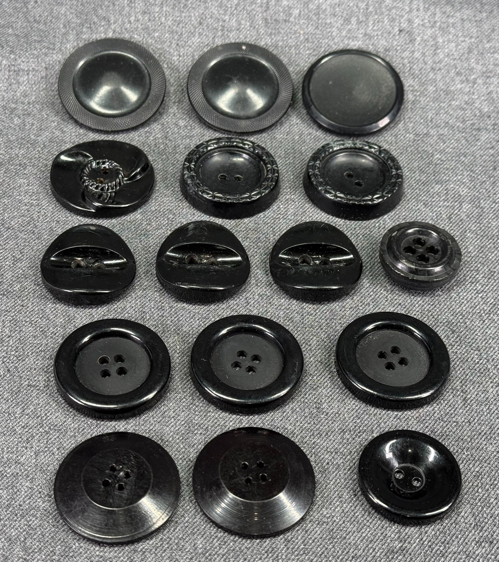 Vintage black celluloid, plastic, galalith buttons. Lot of 15: IN HOUSE FLAT SHIPPING & HANDLING COST WITHIN ALL THE U.S. : $7 To bypass LiveShipping, and use our In-House shipping service for $7 or shipping combined for multiple lots, please select “Arrange Yo
