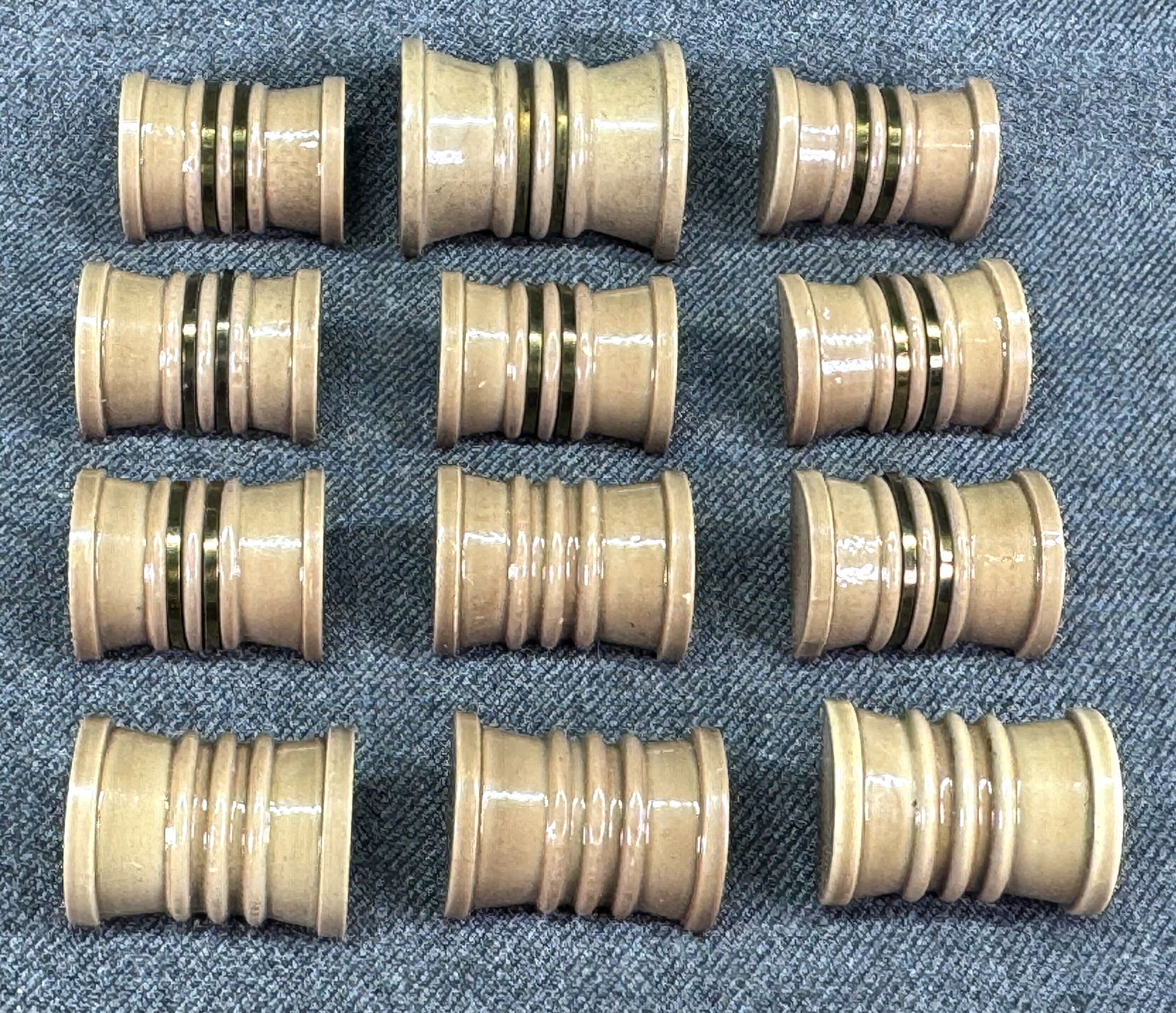 Vintage goldtone metal wired & unwired striped beigeplastic bow shaped buttons. Lot of 12 . Unused (1 of 6)
