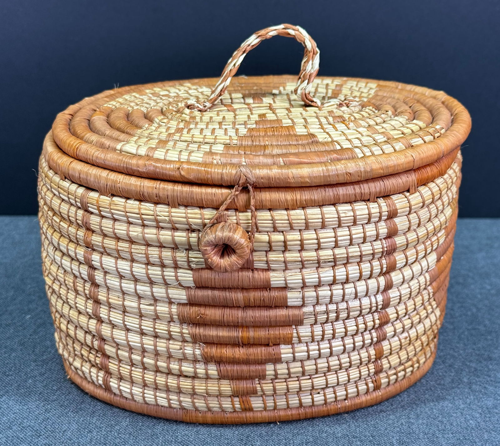 African Uganda Woven Basket with Lid. Woven fibers. Paper label with artist information. (1 of 12)