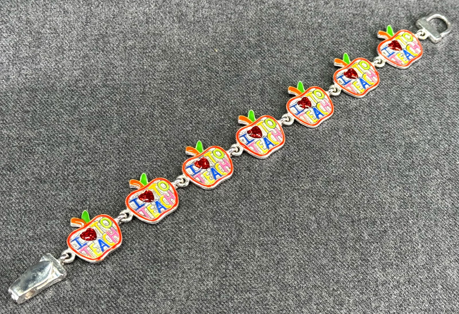 I Love to teach enamel silvertone metal bracelet.: IN HOUSE FLAT SHIPPING & HANDLING COST WITHIN ALL THE U.S. : 7 To bypass LiveShipping, and use our In-House shipping service for 7 or shipping combined for multiple lots, please select “Arrange Your