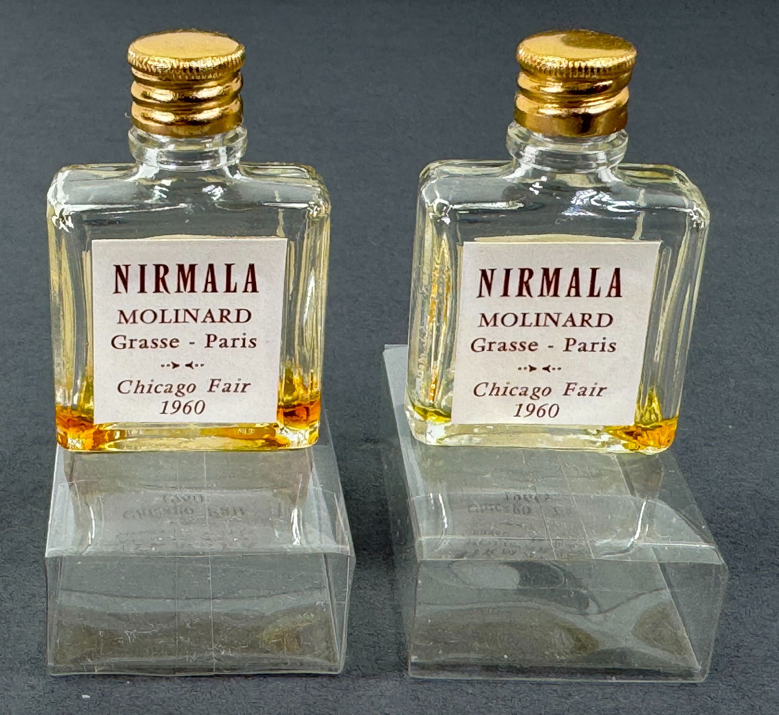 Vintage Nirmala Molinard Paris from 1960 Chicago Fair miniature perfume bottle in case.: IN HOUSE FLAT SHIPPING & HANDLING COST WITHIN ALL THE U.S. : 7 To bypass LiveShipping, and use our In-House shipping service for 7 or shipping combined for multiple lots, please select “Arrange Your