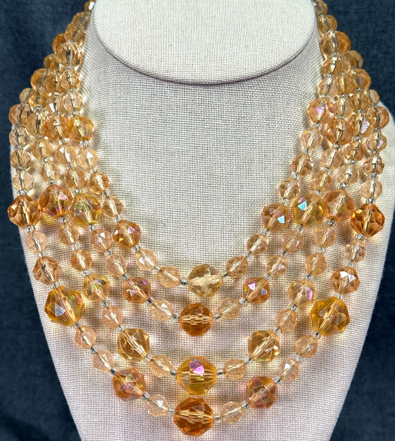 Vintage Japan iridescent peach plastic beads 4 strands collar bib necklace.: Vintage Japan iridescent peach plastic beads 4 strands collar bib necklace.. Marked. For measures please refer to the pictures taken with a measuring tape. Weight: 70 Grams. IN HOUSE FLAT SHIPPING & H