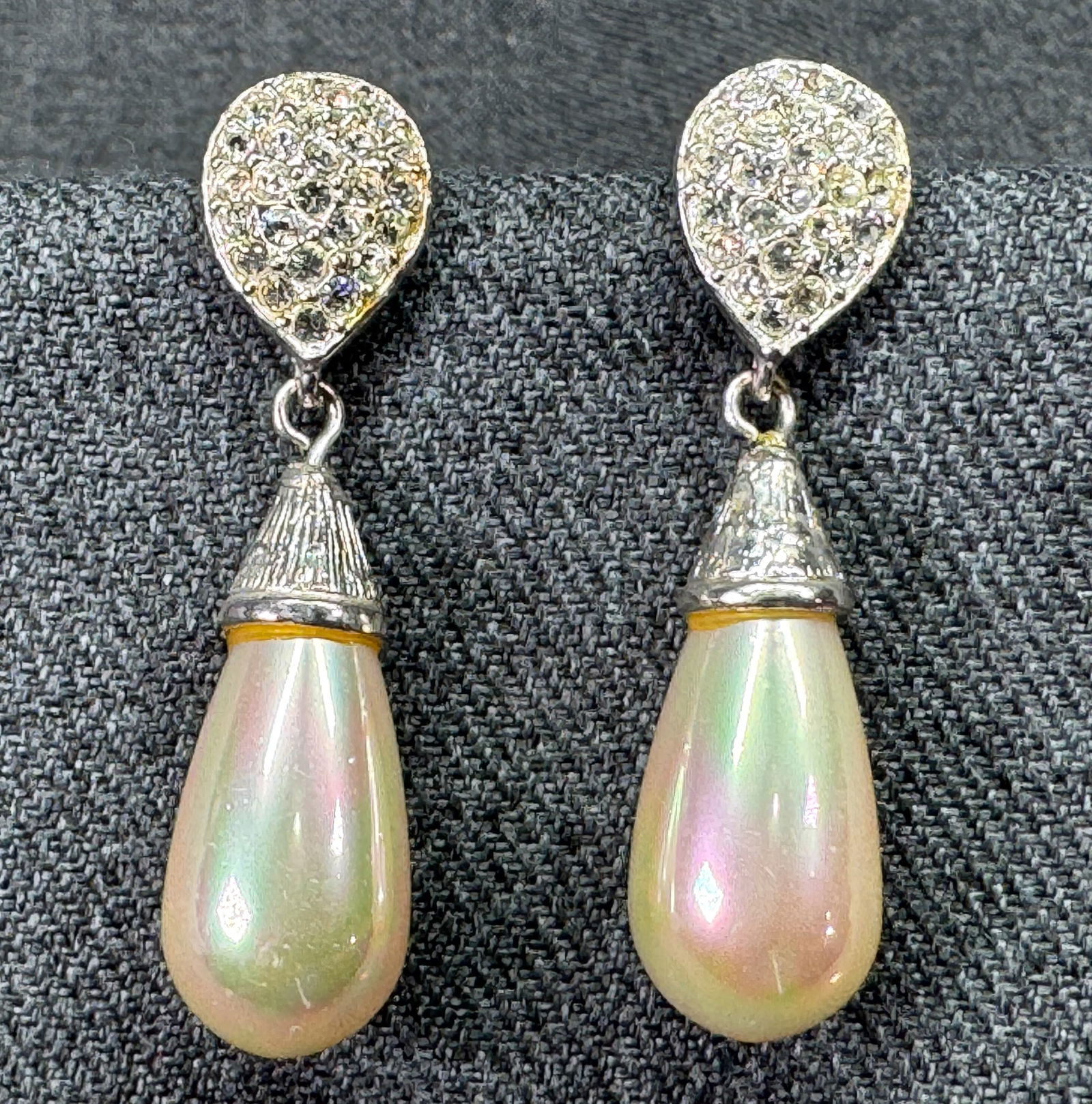 Vintage Roman pearly drop clear rhinestones silver-toned stud earrings: Vintage Roman pearly drop clear rhinestones silver-toned stud earrings. Marked. For measures please refer to the pictures taken with a measuring tape. Weight: 9 Grams. IN HOUSE FLAT SHIPPING & HANDLIN