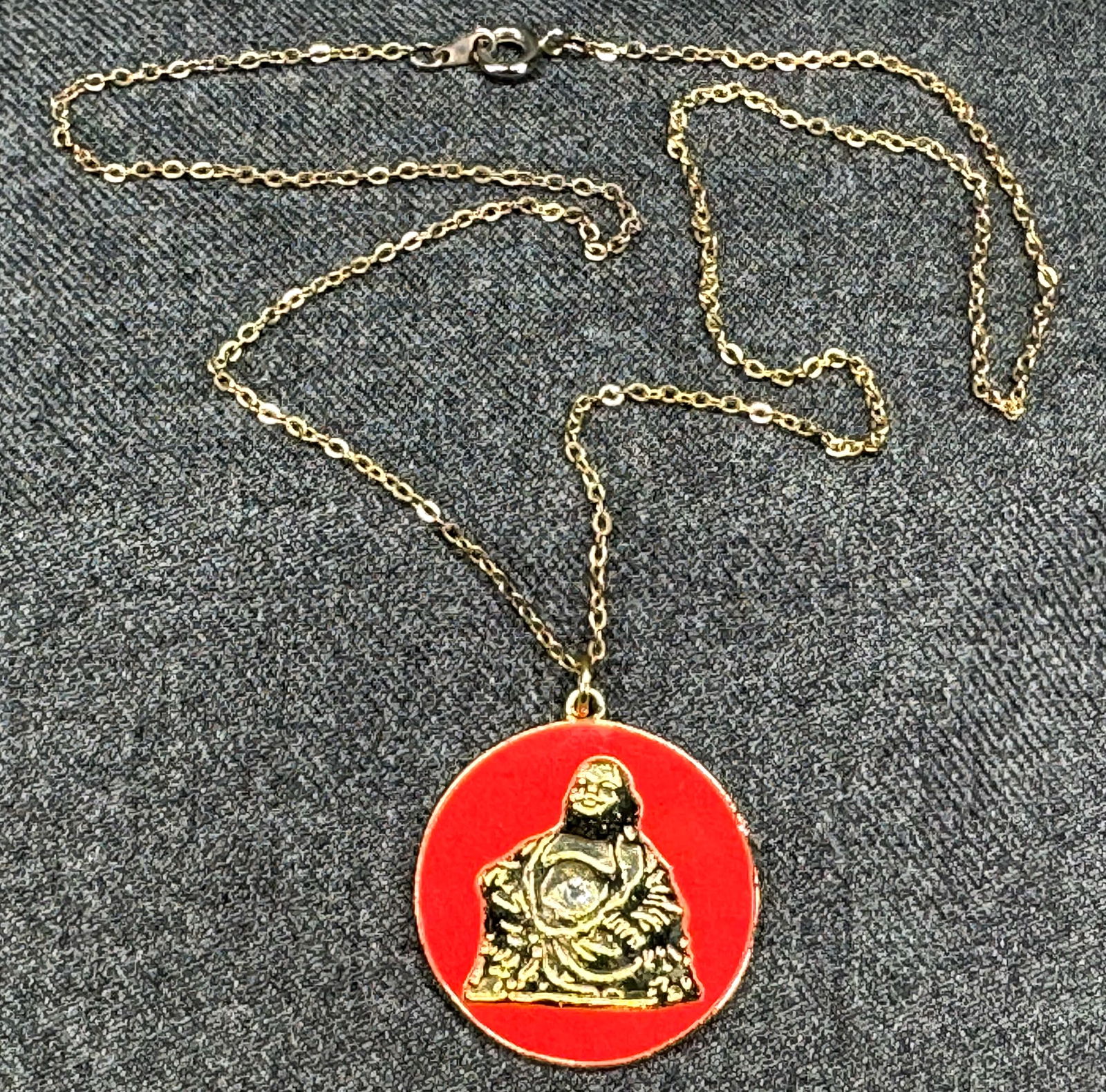 Vintage Buddha medal chain necklace. Clear crystals red enamel gold-toned metal.: Vintage Buddha medal chain necklace. Clear crystals red enamel gold-toned metal. Unmarked. For measures please refer to the pictures taken with a measuring tape. Weight: 9 Grams. IN HOUSE FLAT SHIPPIN