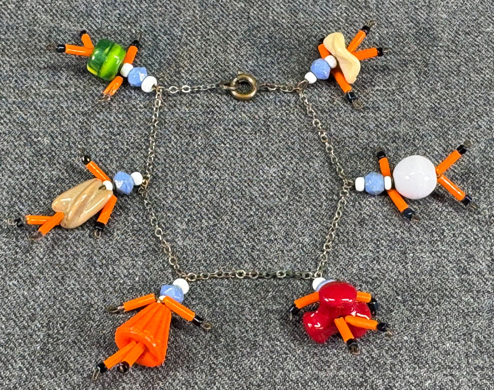 Vintage wired glass beads dancers charm bracelet: IN HOUSE FLAT SHIPPING & HANDLING COST WITHIN ALL THE U.S. : $7 To bypass LiveShipping, and use our In-House shipping service for $7 or shipping combined for multiple lots, please select “Arrange Yo