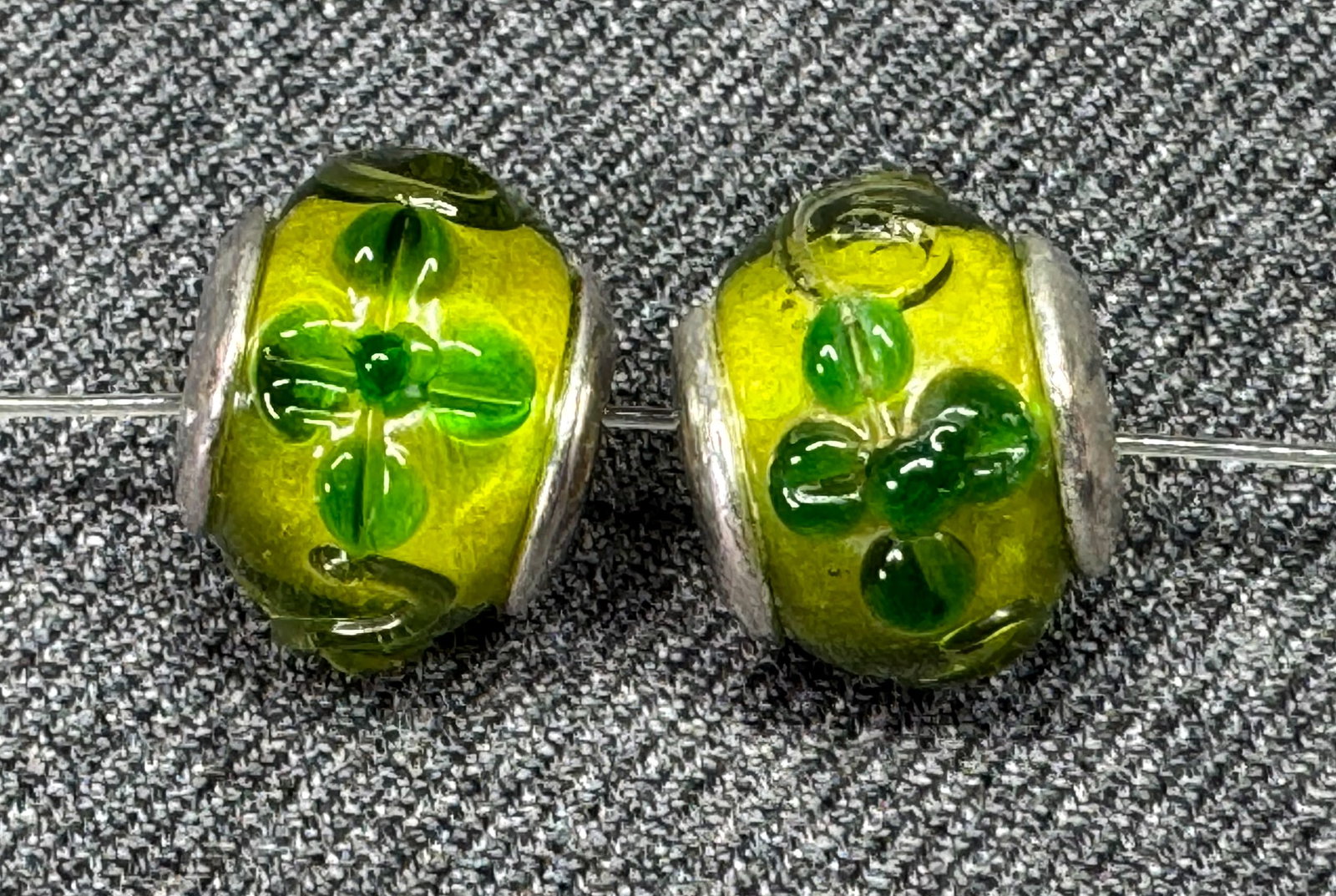 Vintage artisan assorted glass silver rim beads charms. Lot of 2: Vintage artisan assorted glass silver rim sliding beads charms. Lot of 2. Unmarked. For measures please refer to the pictures taken with a measuring tape. Weight: 7 Grams . IN HOUSE FLAT SHIPPING & HA