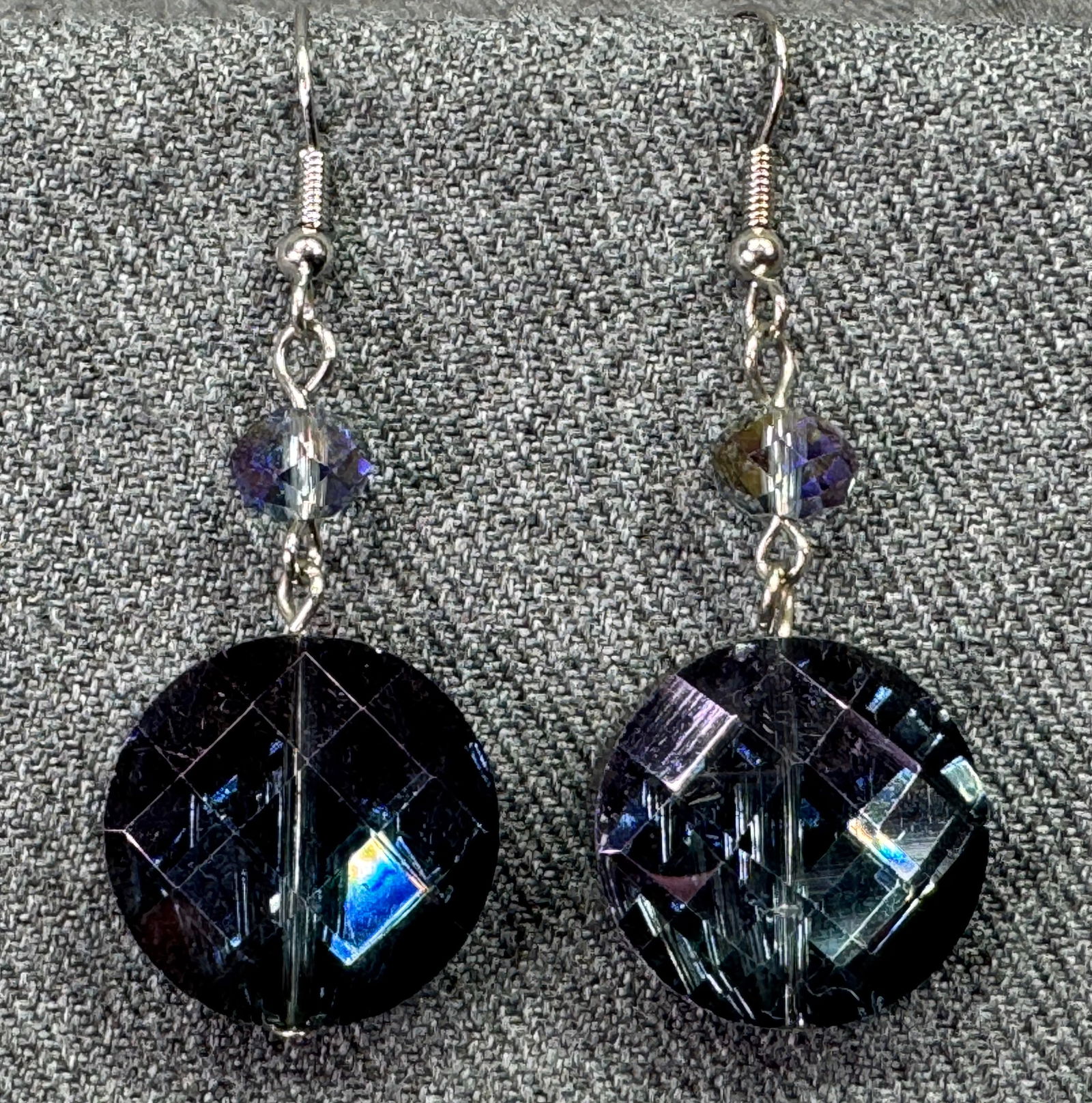 Vintage AB purple crystals silver-toned hook earrings. a: Vintage AB purple crystals silver-toned hook earrings. Unmarked. For measures please refer to the pictures taken with a measuring tape. Weight: 11 Grams. IN HOUSE FLAT SHIPPING & HANDLING COST WITHIN