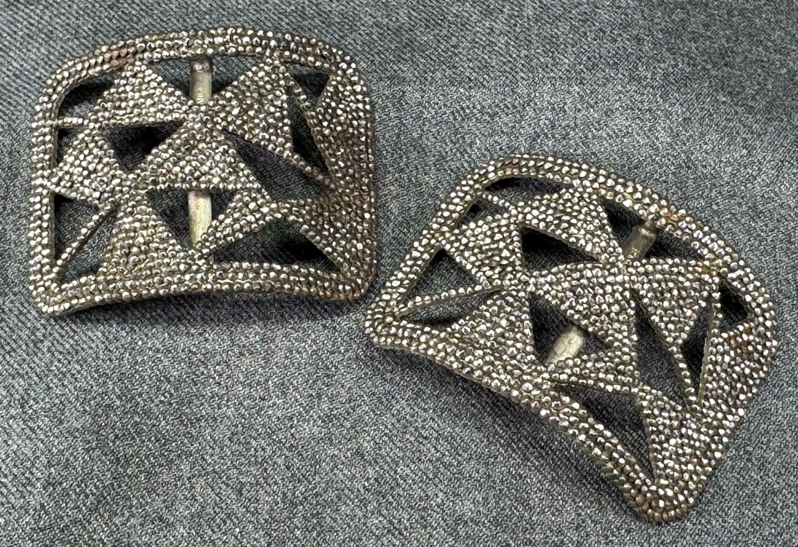 Antique French Victorian cut steel curved shoe buckles. a: Antique French Victorian cut steel curved shoe buckles. Marked France. For measures please refer to the pictures taken with a measuring tape. Weight: 46 Grams. IN HOUSE FLAT SHIPPING & HANDLING COST W