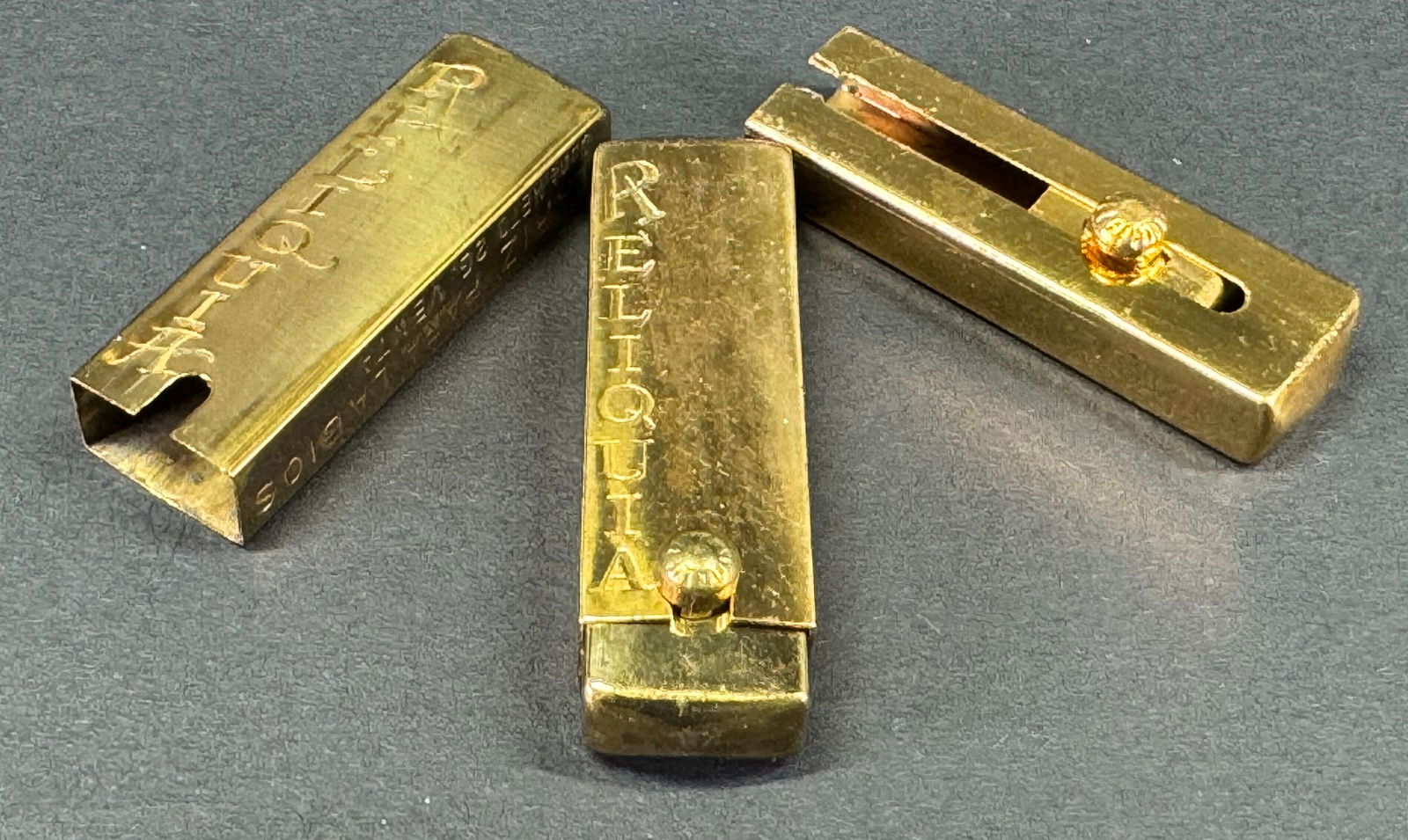 Vintage unused brass Reliquia lipstick holder cases. Lot of 10. (1 of 10)