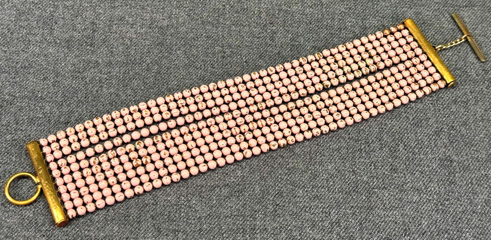 Antique art deco rose enamel multi ball chain bracelet: Antique art deco rose enamel gold-toned multi ball chain bracelet. Unmarked For measures please refer to the pictures taken with a measuring tape. Weight: 42 Grams. For measures please refer to the pi