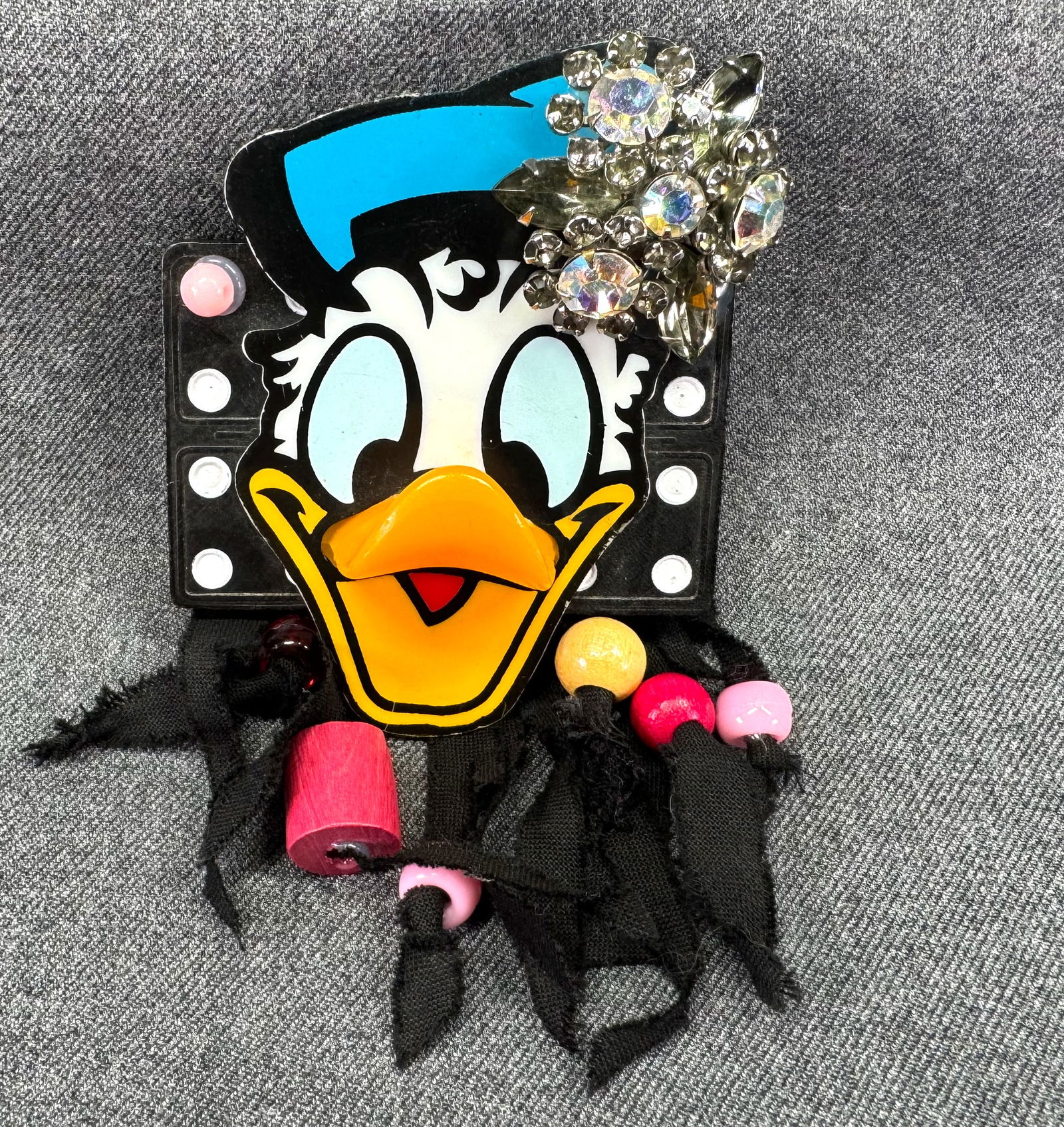 Vintage artsy assemblage Donald's All Dolled Up by Bobbi brooch pin: IN HOUSE FLAT SHIPPING & HANDLING COST WITHIN ALL THE U.S. : 7 To bypass LiveShipping, and use our In-House shipping service for 7 or shipping combined for multiple lots, please select “Arrange Your