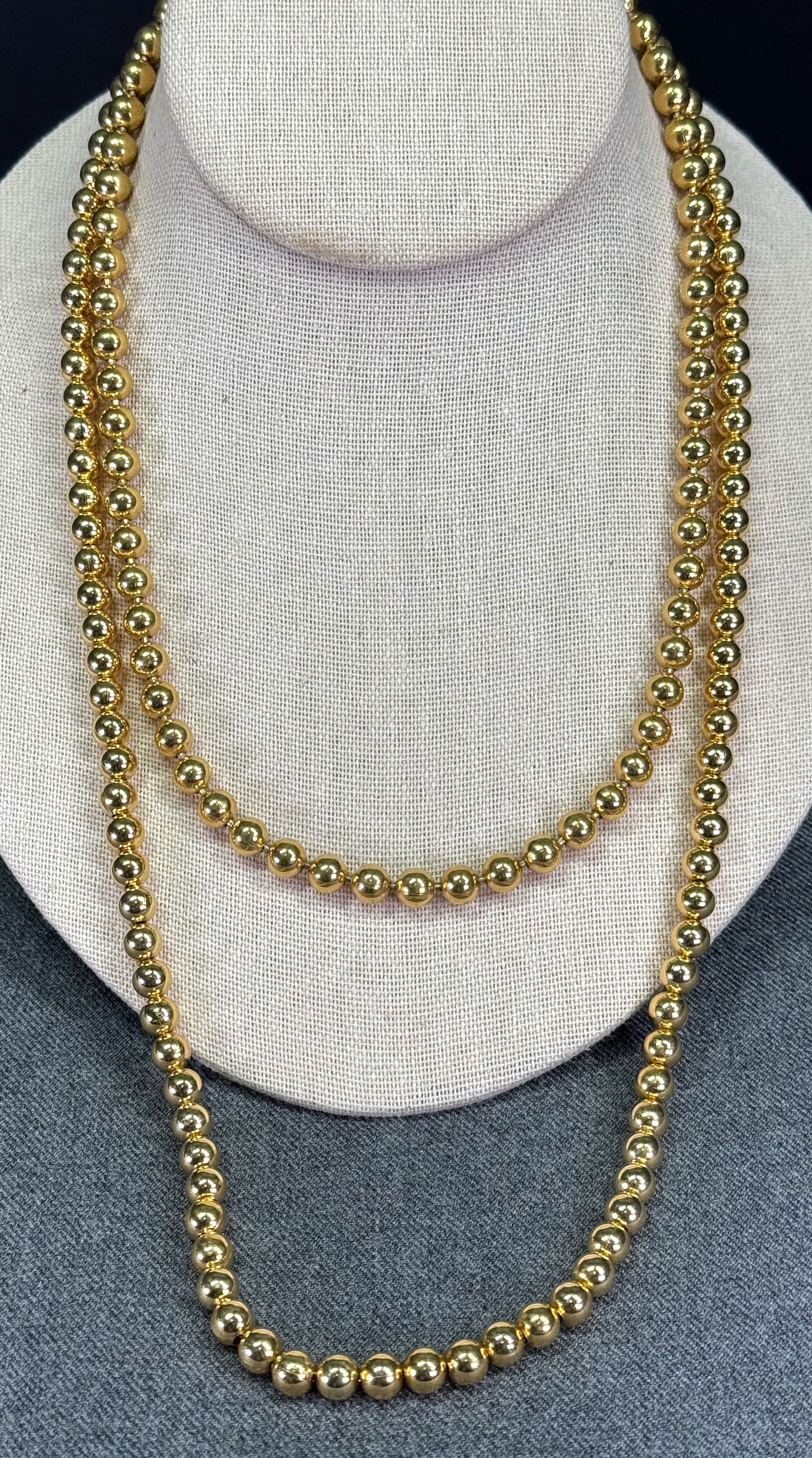Vintage 80s goldtone ball chain necklaces. The longer one is marked Napier: Vintage 80s goldtone ball chain necklaces. The longer one is marked Napier, the shorter is unmarked For measures please refer to the pictures taken with a measuring tape. Weight: 73 Grams. For measure