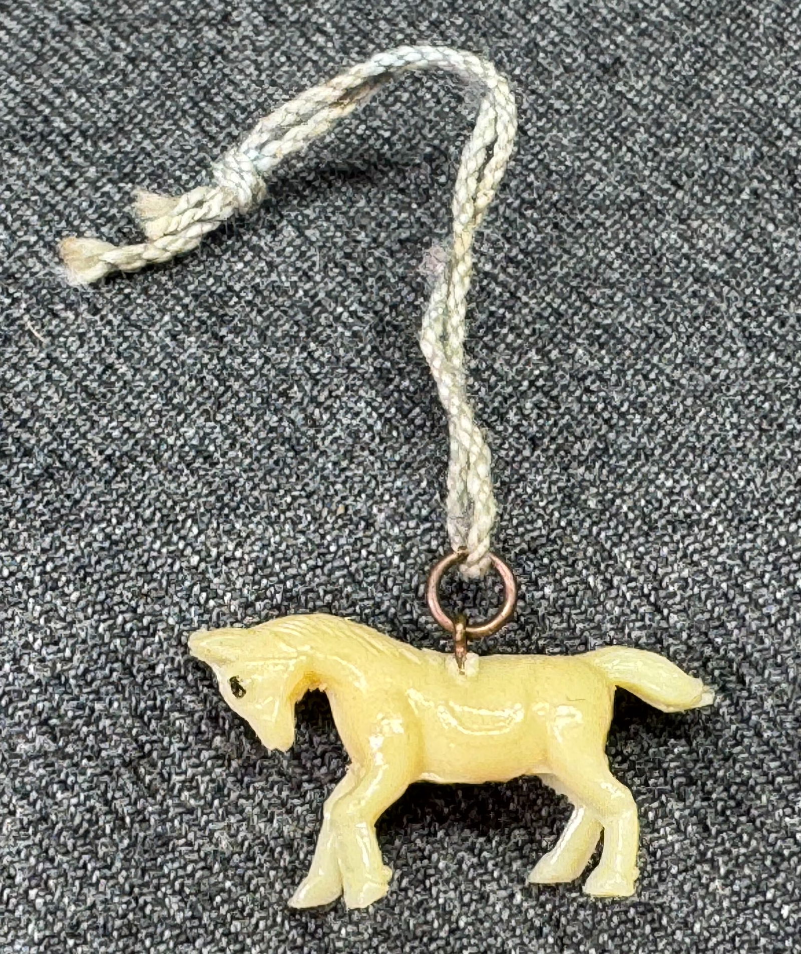 Antique 1930s Japanese Kobe Celluloid Cracker Jack Horse charm *B: Antique 1930s Japanese Kobe Celluloid Cracker Jack Horse charm. Marked Japan. For measures please refer to the pictures taken with a measuring tape. Weight: 1 Grams. IN HOUSE FLAT SHIPPING & HANDLING