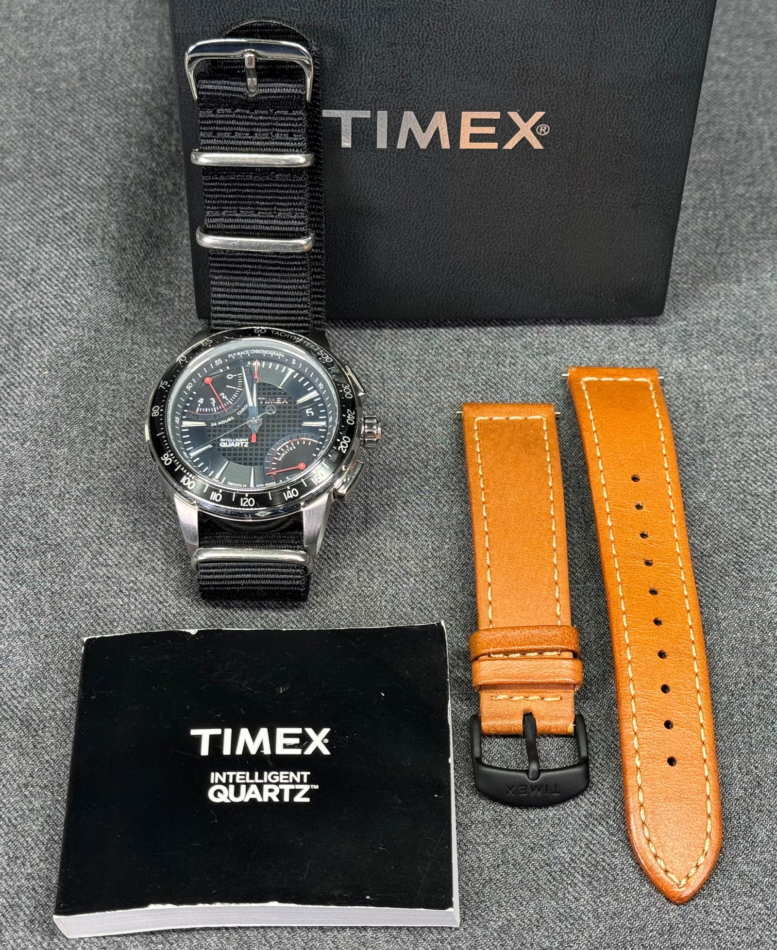 Unworn Timex Intelligent Quartz Fly Back Chronograph Watch: Unworn Timex Intelligent Quartz Fly Back Chronograph Watch Fly back Chronograph movement. Case width: 42 mm. Watch crystal still with protective film.(bear this in mind when you close up the photos).
