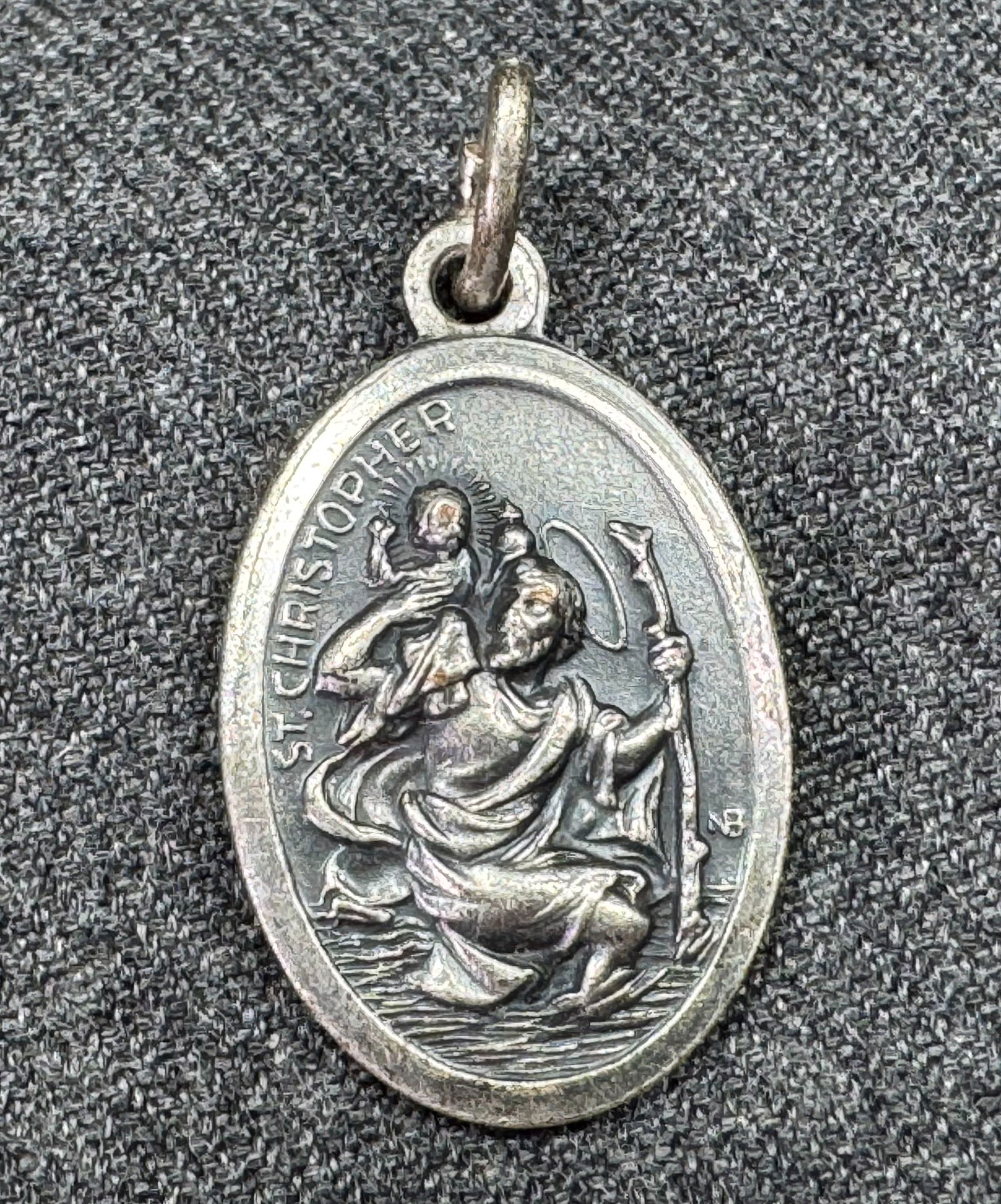 Vintage Italian Saint Christopher Medal.: Vintage Italian Saint Christopher Medal. Marked Italy. For measures please refer to the pictures taken with a measuring tape. Weight: 4 Grams. IN HOUSE FLAT SHIPPING & HANDLING COST WITHIN ALL THE U.S