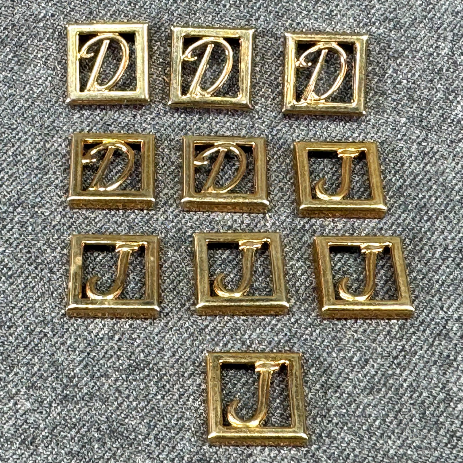 Vintage letter J & D initial gold-toned appliques embellisments. Lot of 10: Vintage letter J & D initial gold-toned appliques embellisments. Lot of 10. Unused. For measures please refer to the pictures taken with a measuring tape. Weight: 11 Grams. IN HOUSE FLAT SHIPPING & HA