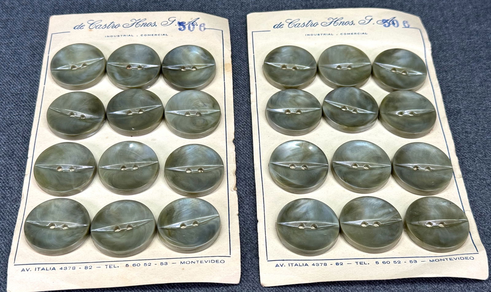 Vintage cat-eye marbled greenish grey plastic buttons. 24 in total. Unused in card.: Vintage cat-eye marbled greenish grey plastic buttons. 24 in total. Unused in card. For measures please refer to the pictures taken with a measuring tape. Weight:40 Grams. IN HOUSE FLAT SHIPPING & HAN