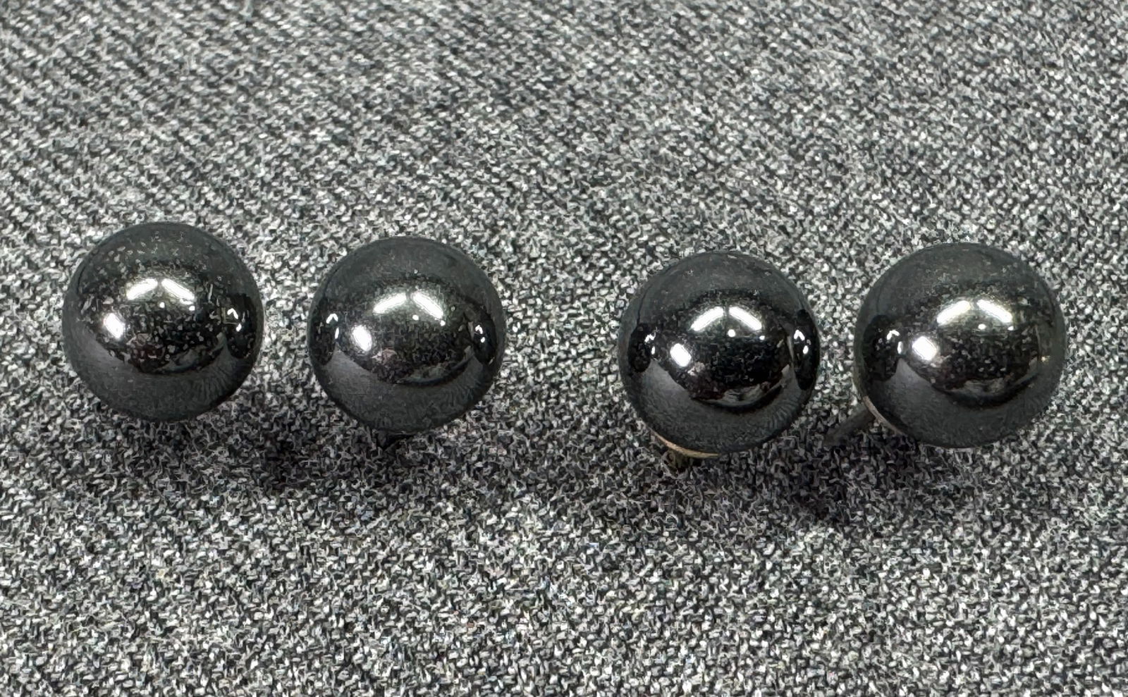 Vintage hematite bead ball silver-toned metal stud earrings. 2 pairs. *b: Vintage hematite bead ball silver-toned metal stud earrings. 2 pairs. Unmarked. For measures please refer to the pictures taken with a measuring tape. Weight: 6 Grams. IN HOUSE FLAT SHIPPING & HANDLIN