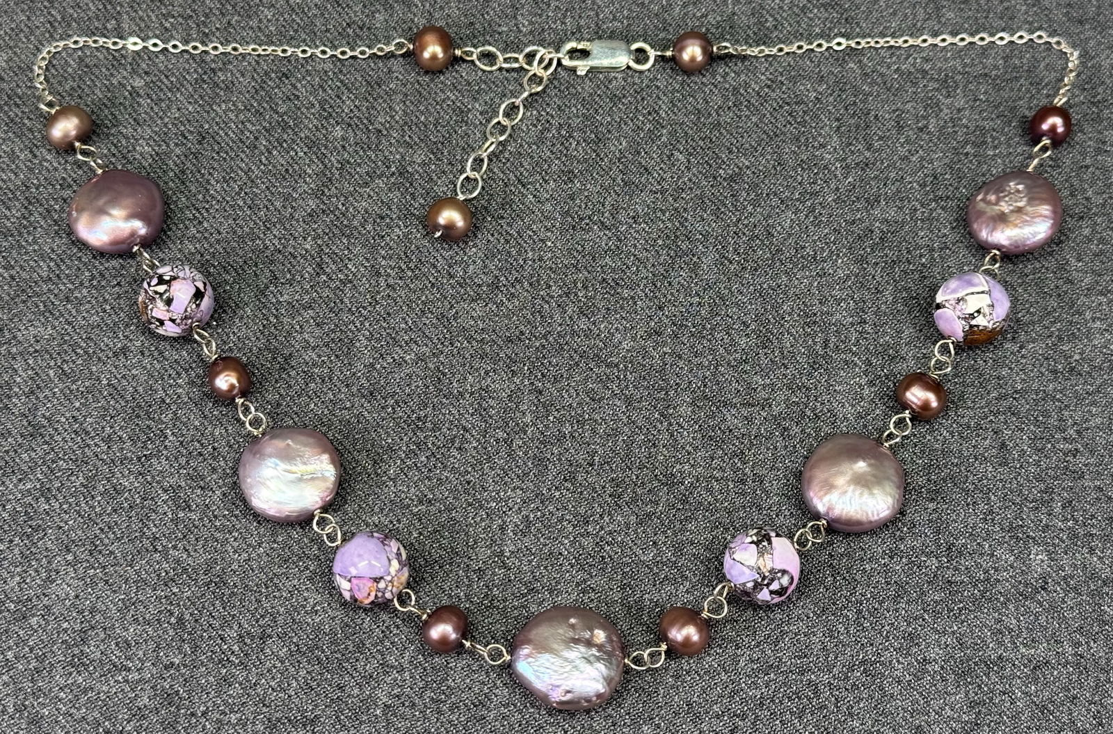 Artisan crafted purple reconstituted stone, baroque pearl sterling silver necklace. *a: Artisan crafted purple reconstituted stone, baroque pearl sterling silver necklace. Marked 925. For measures please refer to the pictures taken with a measuring tape. Weight: 11.28 Grams IN HOUSE FLAT