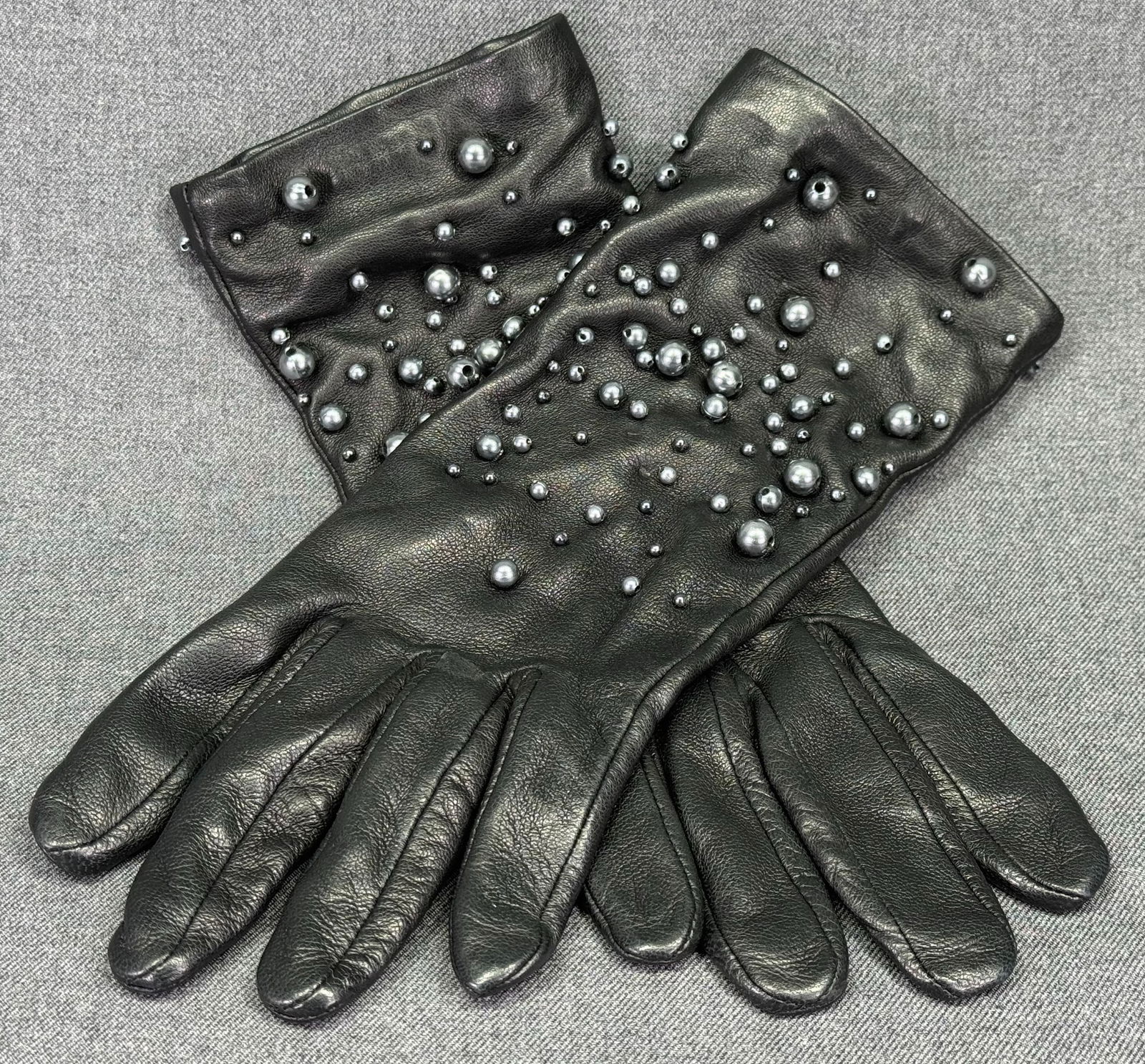Agnelle Paris beaded black lambskin gloves. Size 7 *a: Agnelle Paris beaded black lambskin gloves. Size 7 . Lined . For measures please refer to the pictures taken with a measuring tape. Weight: 50 Grams. IN HOUSE FLAT SHIPPING & HANDLING COST WITHIN ALL