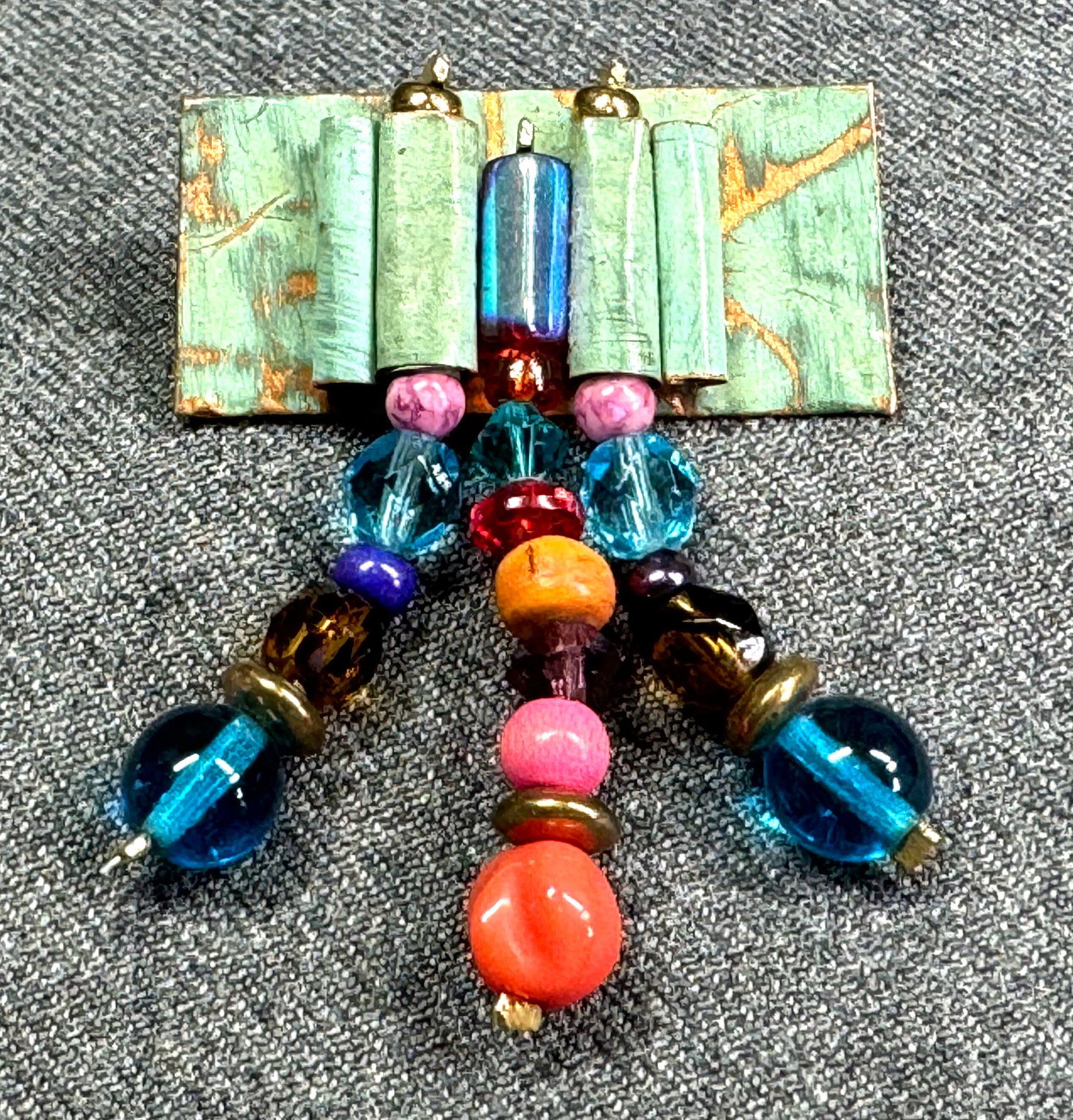 Vintage artsy copper with assorted glass & other beads dangles pin brooch. Signed Steinberg: IN HOUSE FLAT SHIPPING & HANDLING COST WITHIN ALL THE U.S. : $7 To bypass LiveShipping, and use our In-House shipping service for $7 or shipping combined for multiple lots, please select “Arrange Yo