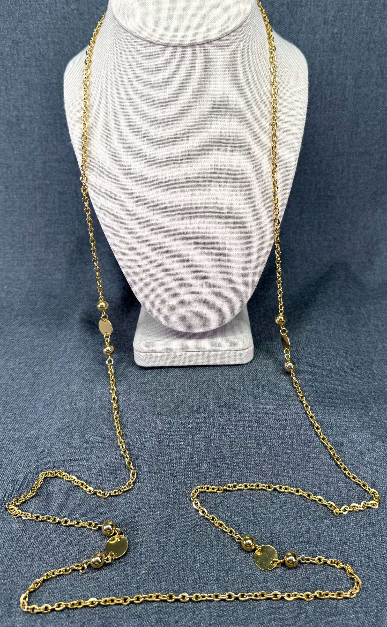 Vintage flapper style gold-toned beads chain necklace. #a: Vintage flapper style gold-toned beads chain necklace. Unmarked. For measures please refer to the pictures taken with a measuring tape. Weight: 35 Grams. IN HOUSE FLAT SHIPPING & HANDLING COST WITHIN