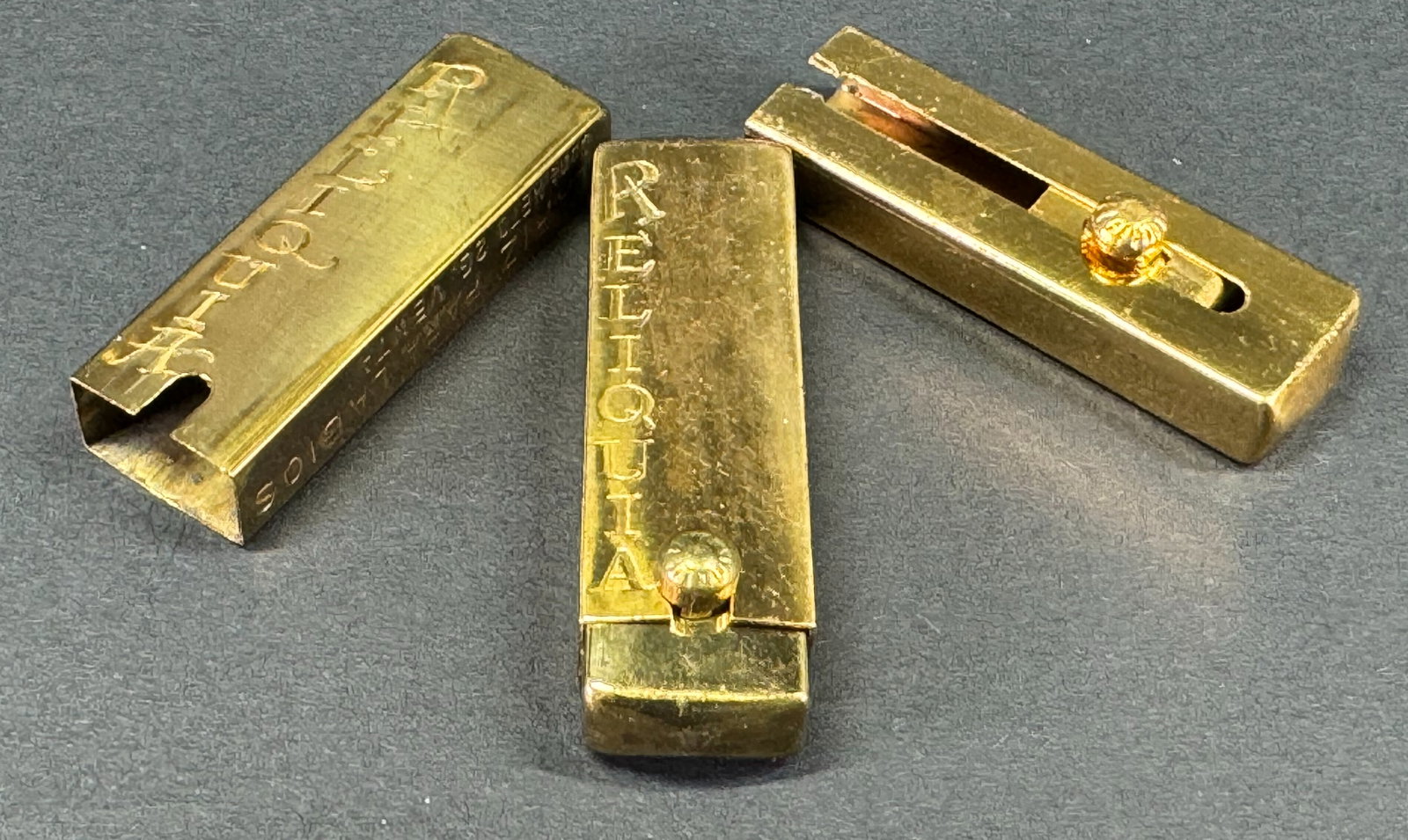 Vintage unused brass Reliquia lipstick holder cases. Lot of 10. (1 of 10)