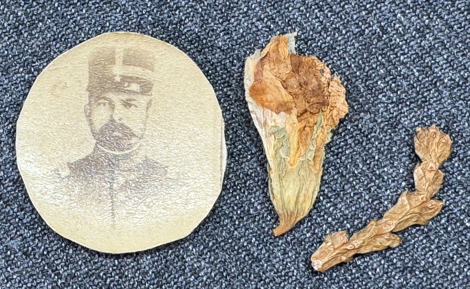 Antique soldier photo and pressed flowers for Victorian locket. #B: Antique soldier photo and pressed flowers for Victorian locket. Unmarked. For measures please refer to the pictures taken with a measuring tape. Weight: 2 Grams. IN HOUSE FLAT SHIPPING & HANDLING COST