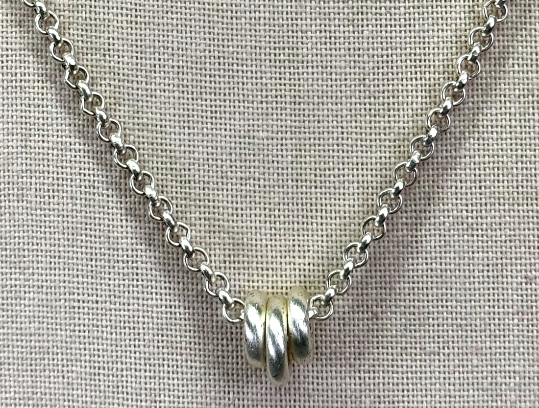 Roberta Chiarella three-ring pendant on a rolo chain strap necklace. *d (1 of 5)
