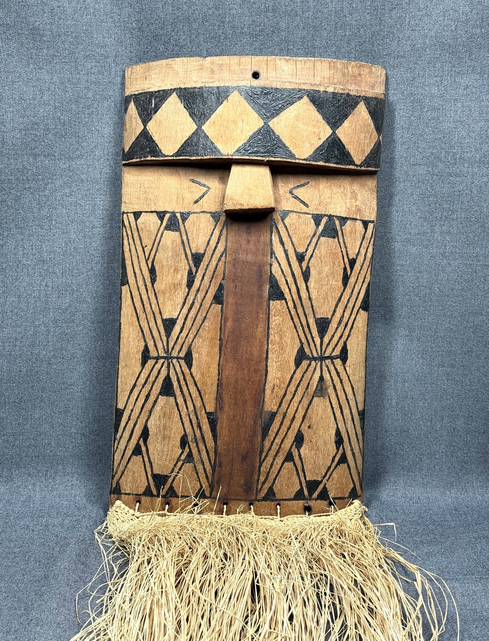 Amazonian Mehinaku Ritual Mask. Carved hardwood, vegetal pigments paint, fibers. (1 of 9)