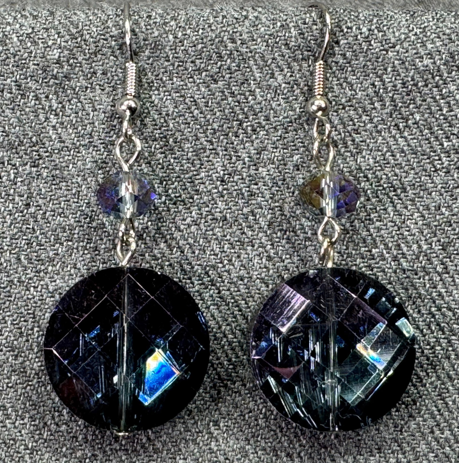 Vintage AB purple crystals silver-toned hook earrings. a: Vintage AB purple crystals silver-toned hook earrings. Unmarked. For measures please refer to the pictures taken with a measuring tape. Weight: 11 Grams. IN HOUSE FLAT SHIPPING & HANDLING COST WITHIN 