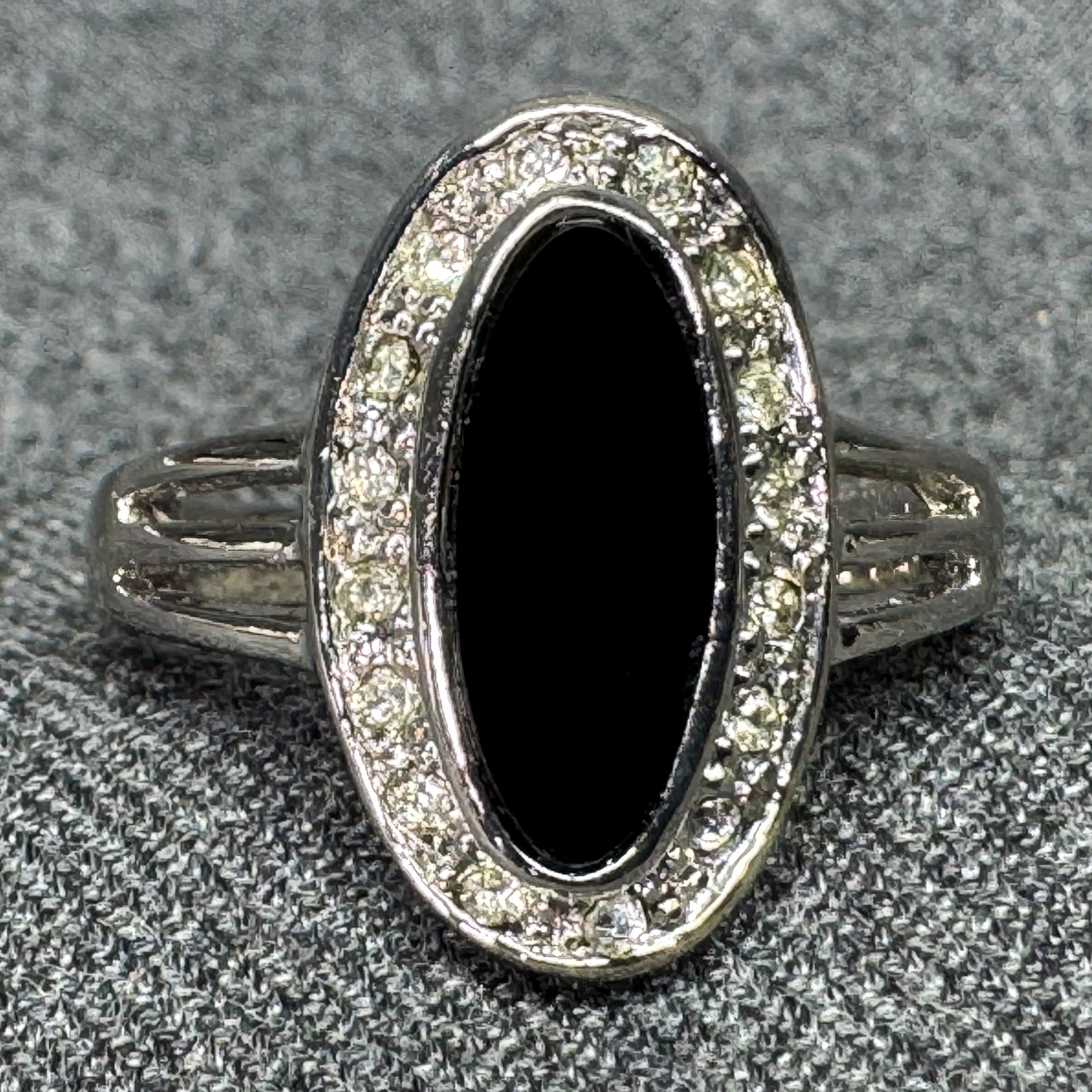 Vintage art deco style enamel & crystals ring. Silver-toned. *e: ntage art deco style black enamel, clear crystals ring. Silver-toned. Unmarked. For measures please refer to the pictures that were taken with a measuring tape. Weight: 6 Grams. IN HOUSE FLAT SHIPPING