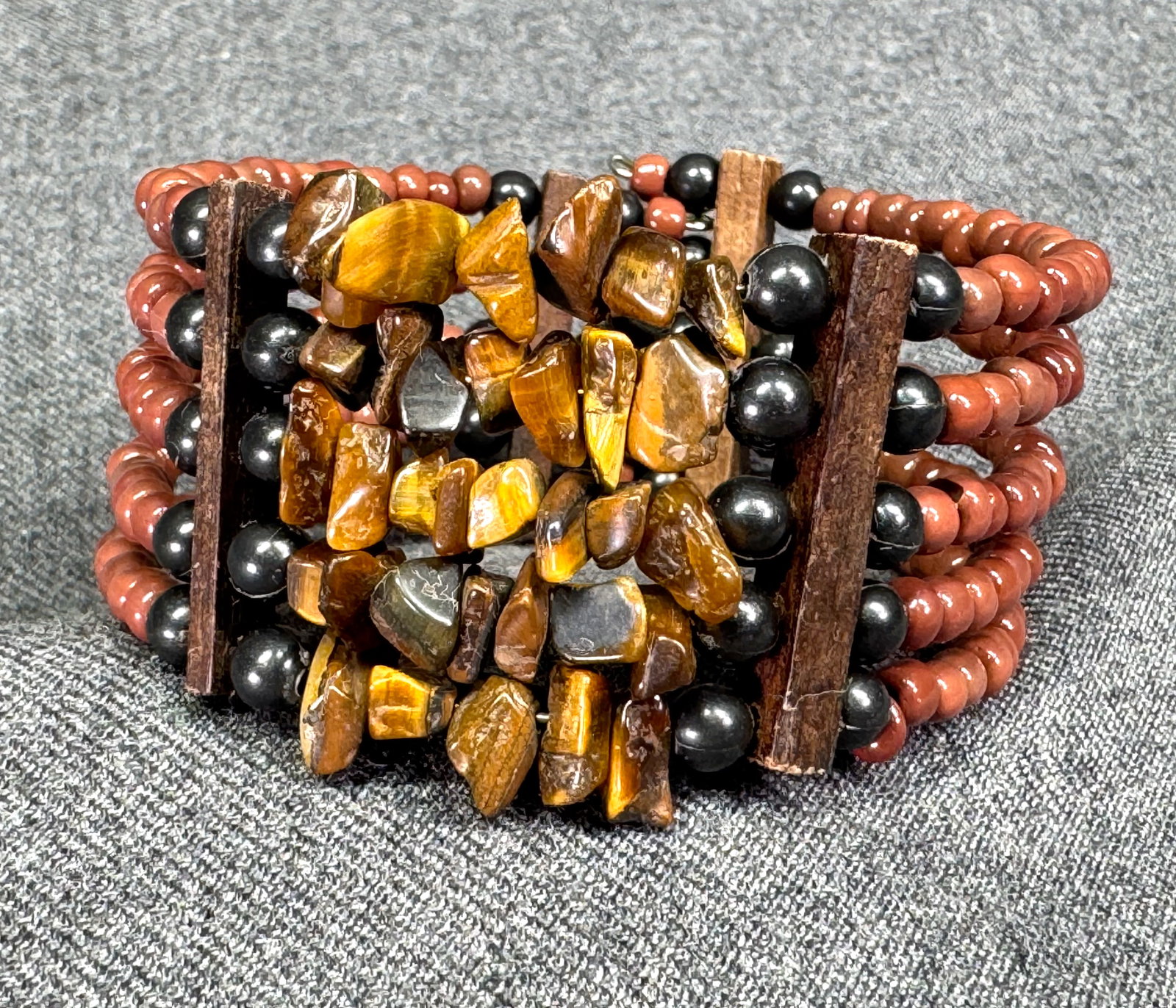 Vintage artisan tiger eye chips , wood, plastic & glass beads wired wrap bracelet: IN HOUSE FLAT SHIPPING & HANDLING COST WITHIN ALL THE U.S. : $7 To bypass LiveShipping, and use our In-House shipping service for $7 or shipping combined for multiple lots, please select “Arrange Yo