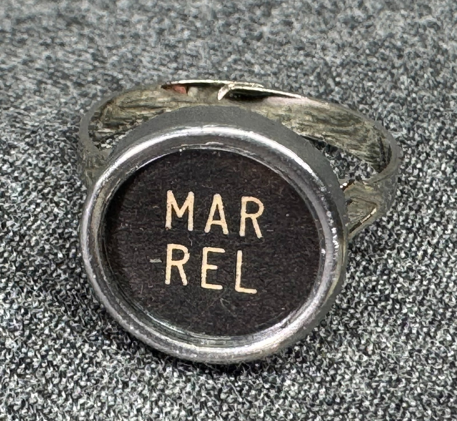 Vintage made w/ typewriter key silver-toned adjustable ring. *a: Vintage made w/ typewriter key silver-toned adjustable ring. Unmarked. For measures please refer to the pictures taken with a measuring tape. Weight: 4 Grams. IN HOUSE FLAT SHIPPING & HANDLING COST WI
