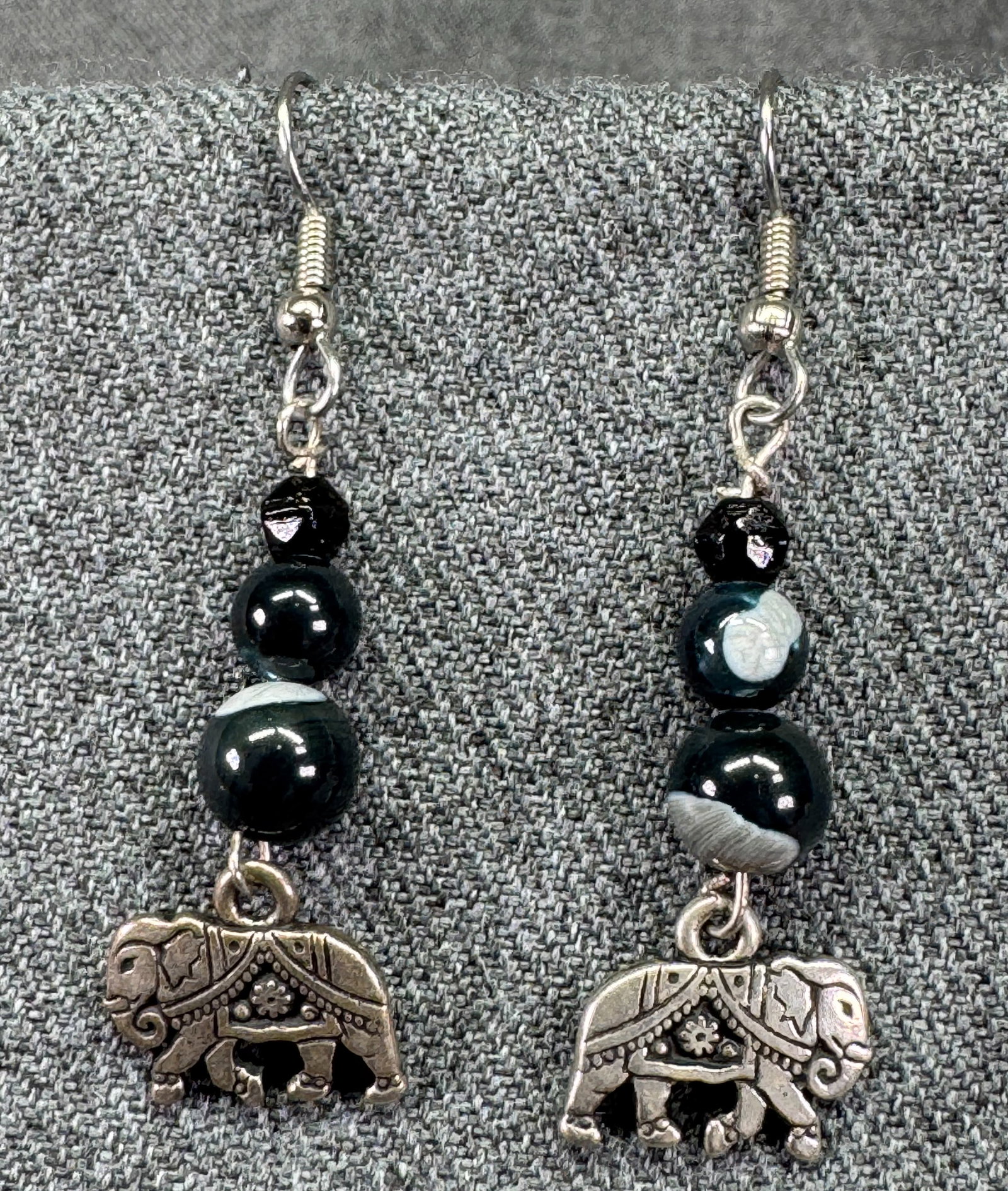 Vintage boho glass beads silver-toned elephant hook earrings. #a: Vintage boho glass beads silver-toned elephant hook earrings.Unmarked. For measures please refer to the pictures taken with a measuring tape. Weight: 5 Grams. IN HOUSE FLAT SHIPPING & HANDLING COST WI