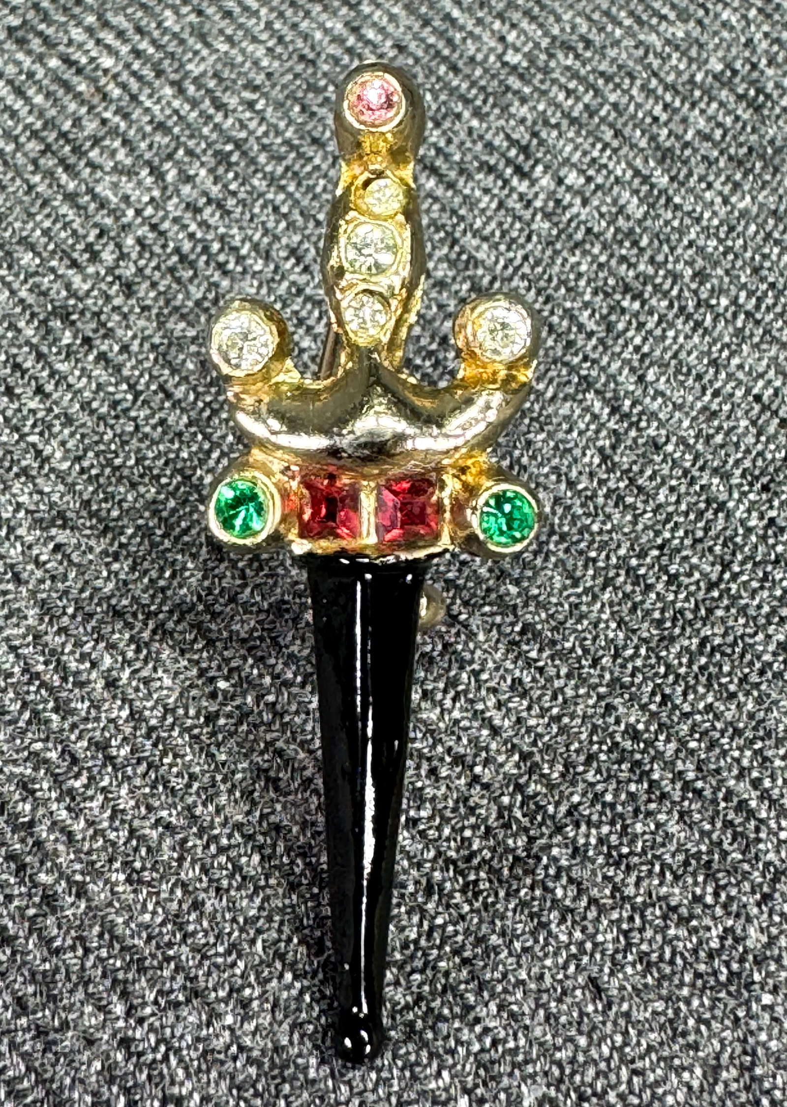Vintage color crystals enamel gold-toned miniature sword brooch pin *a: Vintage color crystals enamel gold-toned miniature sword brooch pin . Unmarked. For measures please refer to the pictures taken with a measuring tape. Weight: 3 Grams. IN HOUSE FLAT SHIPPING & HANDLIN