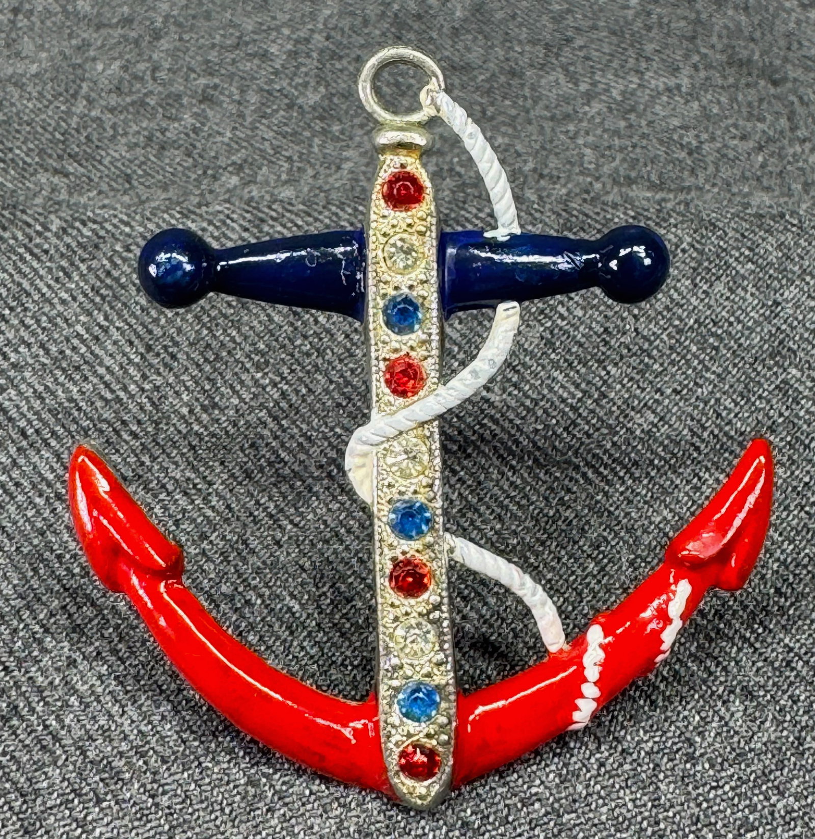 WWII US Home Front Navy Anchor Sweetheart Pot Pin Brooch. *c: WWII US Home Front Navy Anchor Crystals, Enamel Pot metal. Sweetheart Pin Brooch. Unmarked. For measures please refer to the pictures taken with a measuring tape. Weight: 11 Grams. IN HOUSE FLAT SHIPP