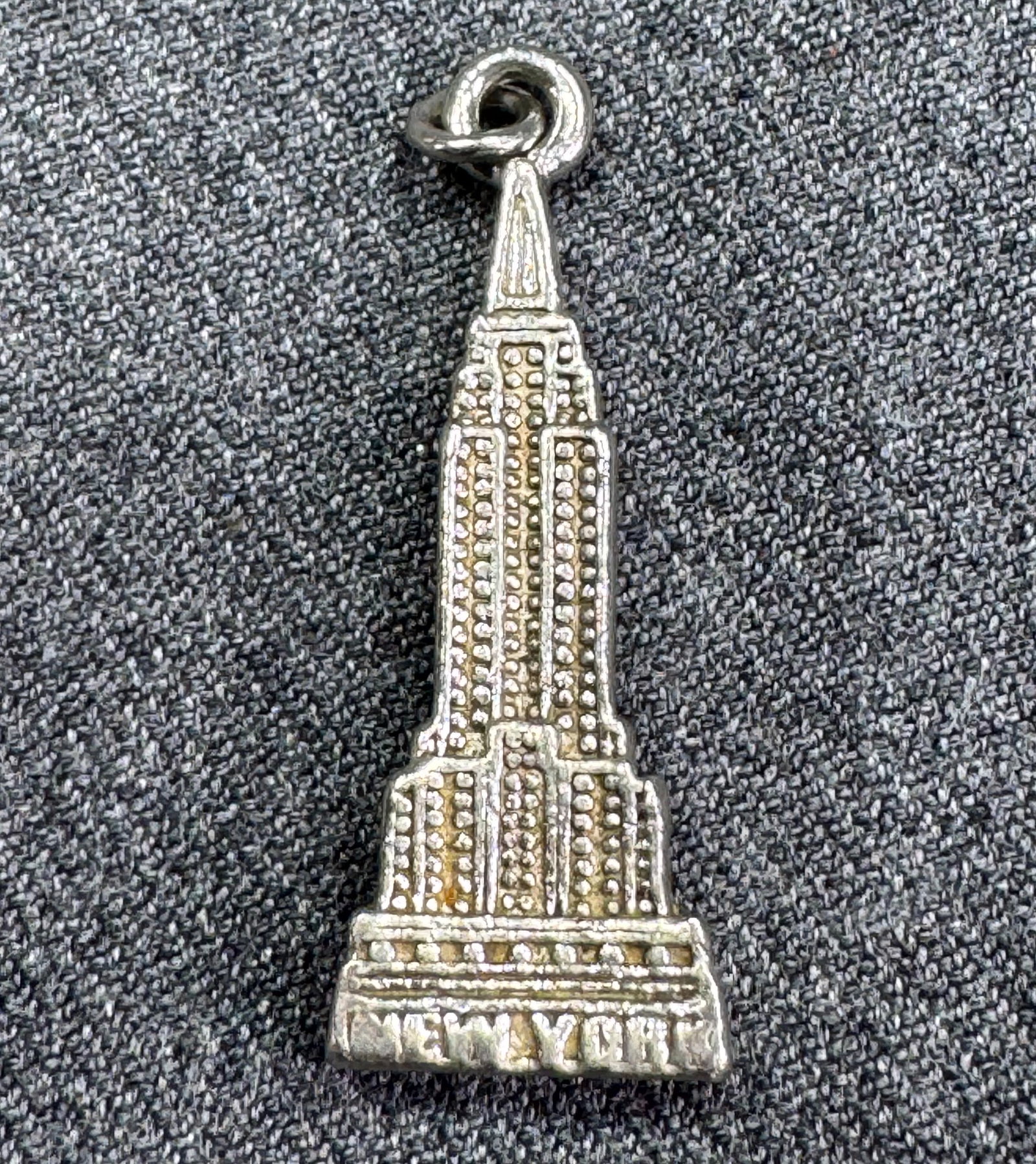 Vintage H Paar Sterling Silver NY Empire State Building Charm Pendant. 7.14 Grams *e: Vintage H Paar Sterling Silver NY Empire State Building Charm Pendant. Marked H. Paar 925. For measures please refer to the pictures that were taken with a measuring tape. Weight: 7.14 Grams. For meas
