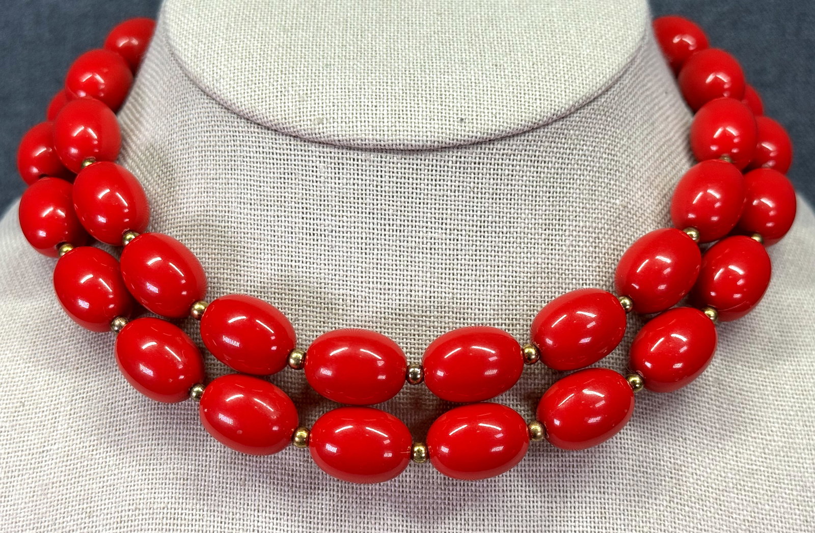 Vintage Monet style red plastic & seed gold-toned beaded necklace. *a: Vintage Monet style red plastic & seed gold-toned beaded necklace.Unmarked. For measures please refer to the pictures taken with a measuring tape. Weight: 57 Grams. IN HOUSE FLAT SHIPPING & HANDLING C