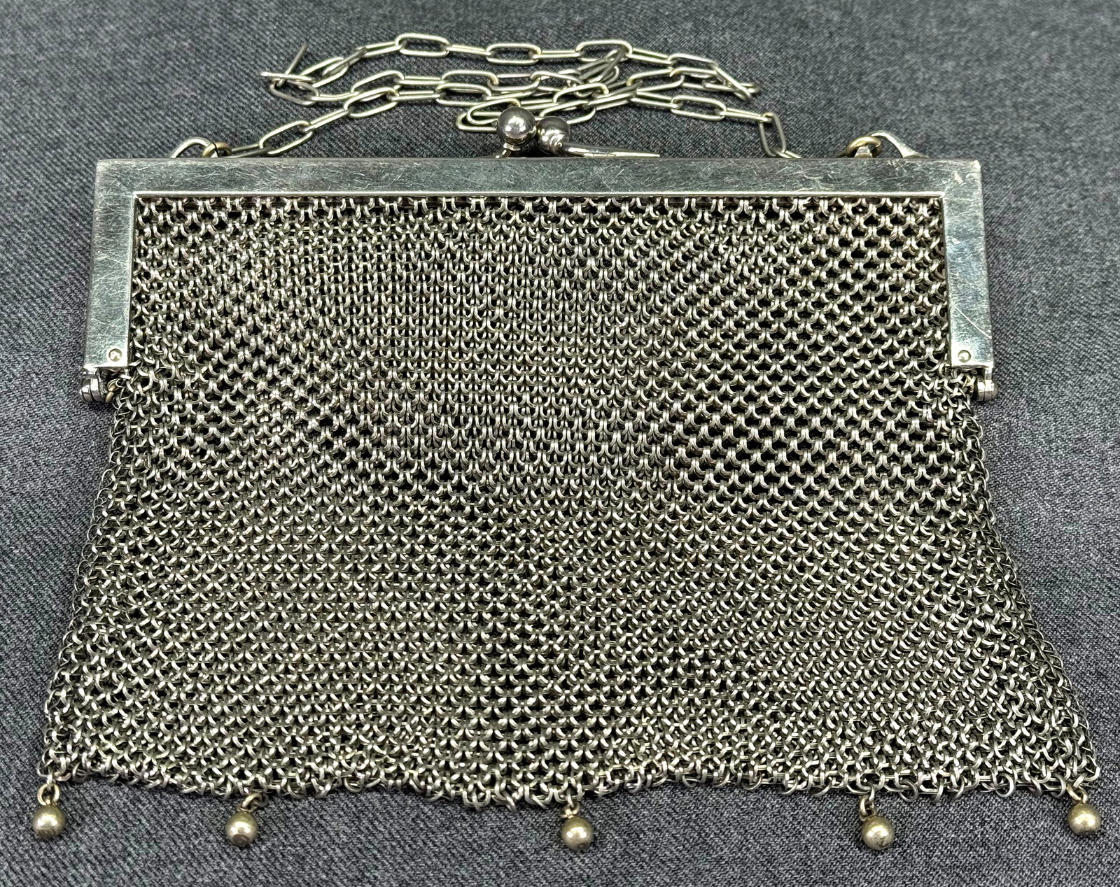 Antique Art Deco Flapper German Silver Chainmail Mesh Purse. Ball Fringe . *g: Antique Art Deco Flapper German Silver Chainmail Mesh Purse. Ball Fringe . Marked German Silver. For measures please refer to the pictures taken with a measuring tape. Weight: 115 Grams. IN HOUSE FLAT