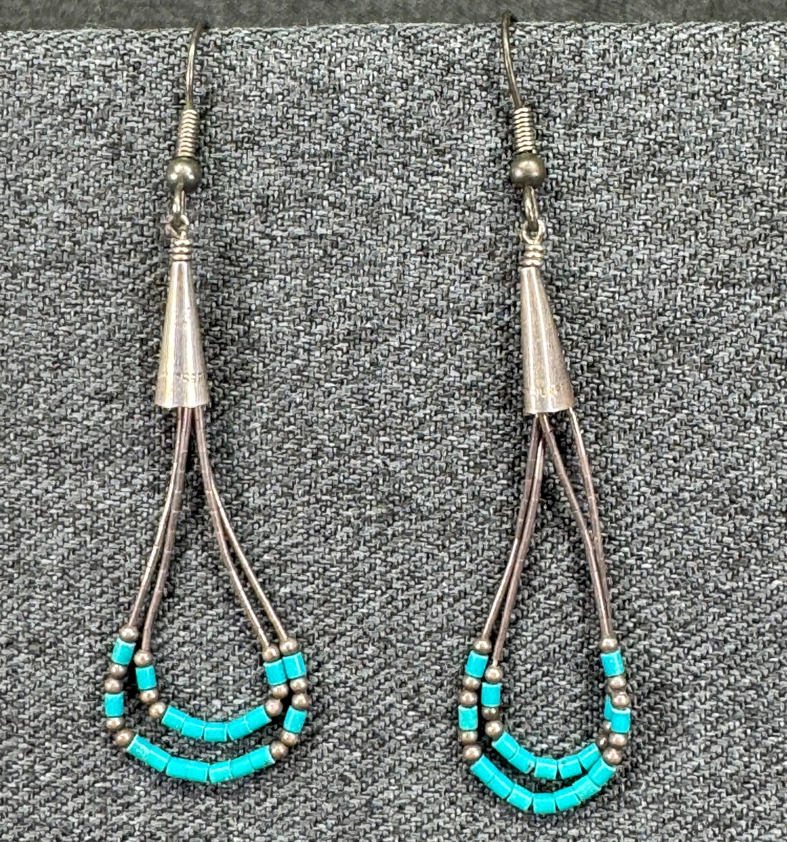 Vintage Southwestern Liquid Silver & Turquoise Double Loop Hook Earrings. *g: Vintage Southwestern Liquid Silver & Turquoise Double Loop Earring. Unmarked. For measures please refer to the pictures taken with a measuring tape. Weight: 3.08 Grams. IN HOUSE FLAT SHIPPING &